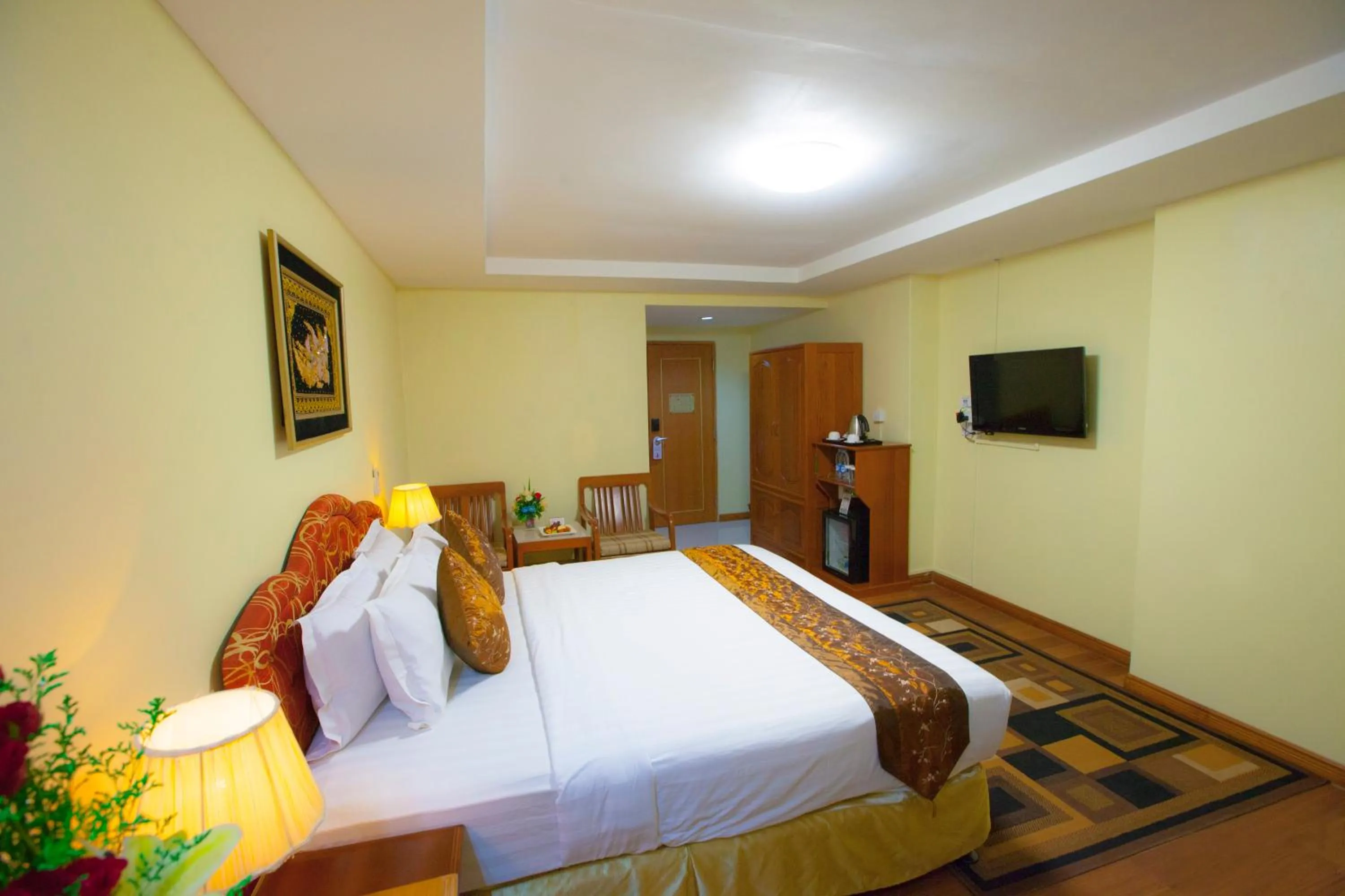 Bed in Grand Palace Hotel