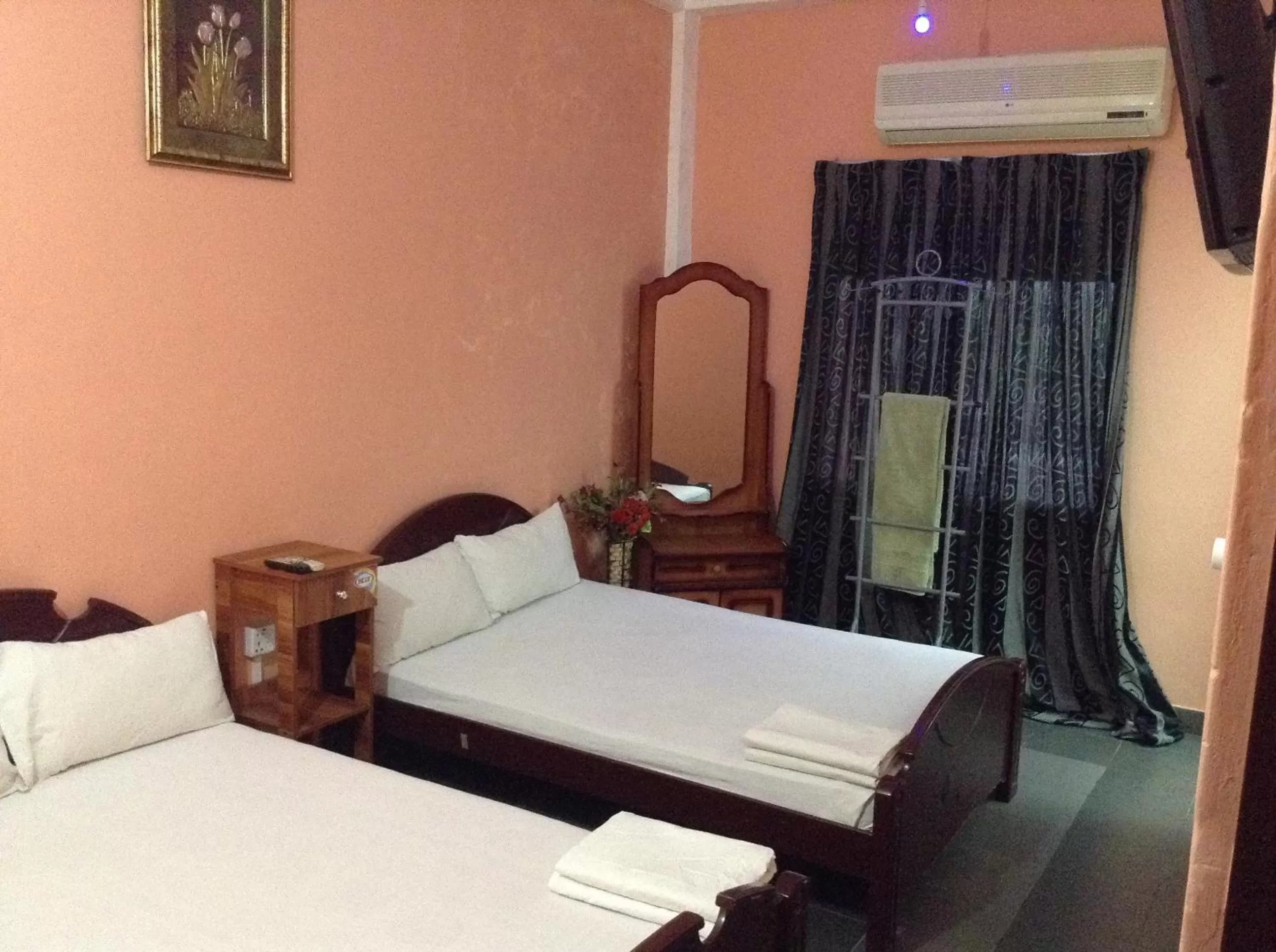 Bed in Sunshine Hotel