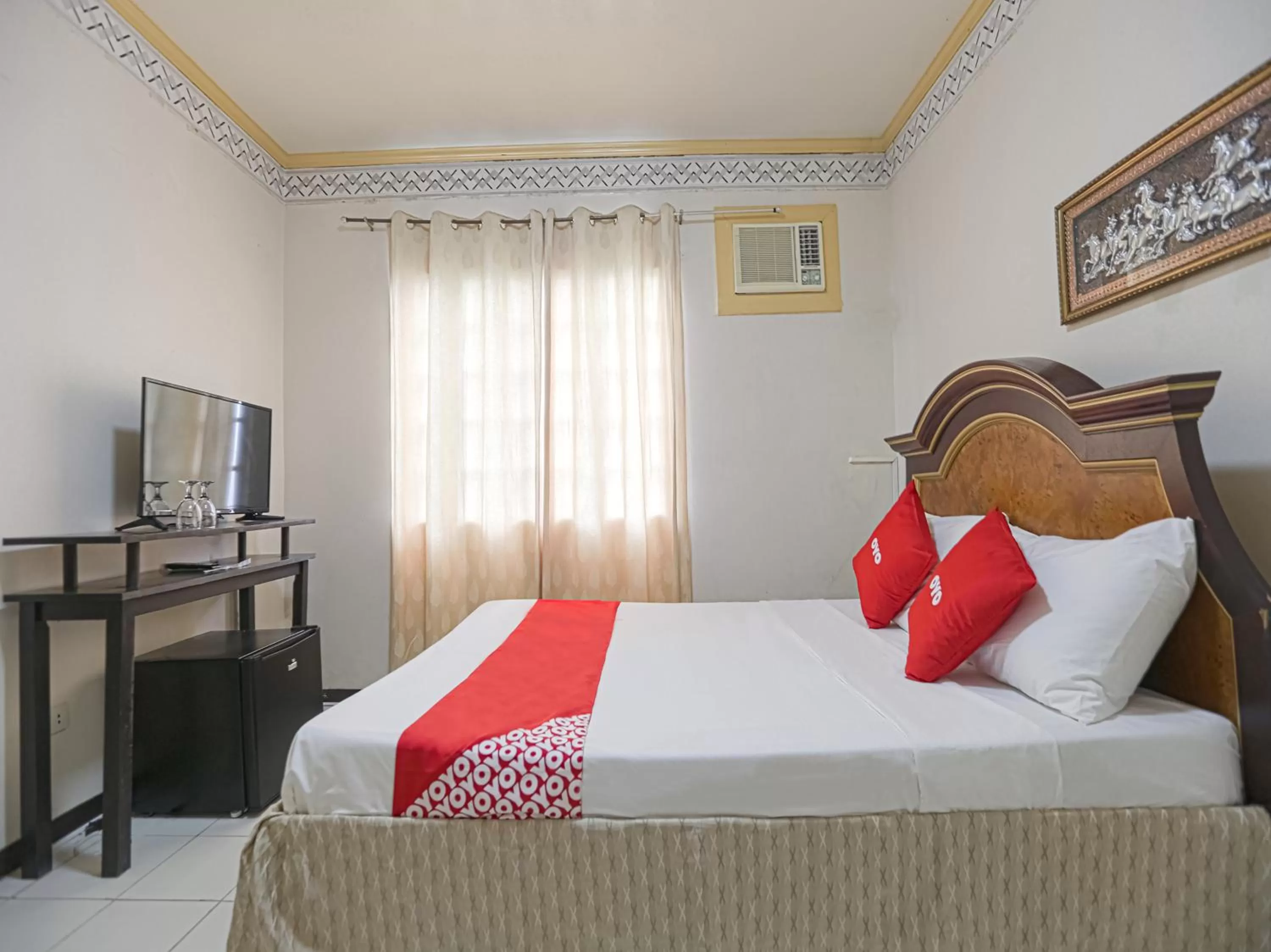 Bedroom in OYO 784 Laura's Garden Resort