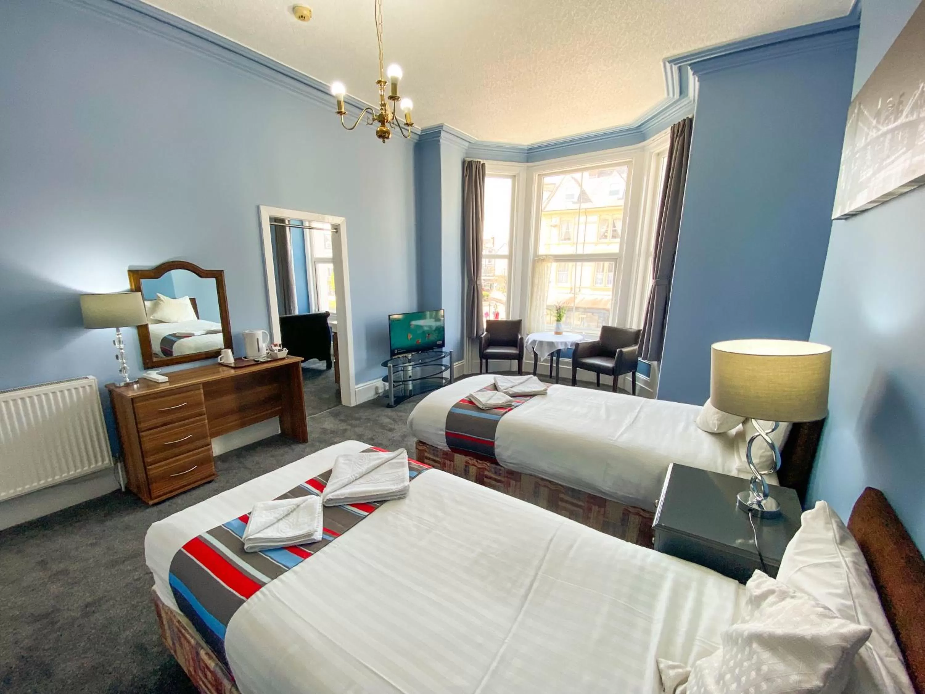 Bed in The Broadway Hotel