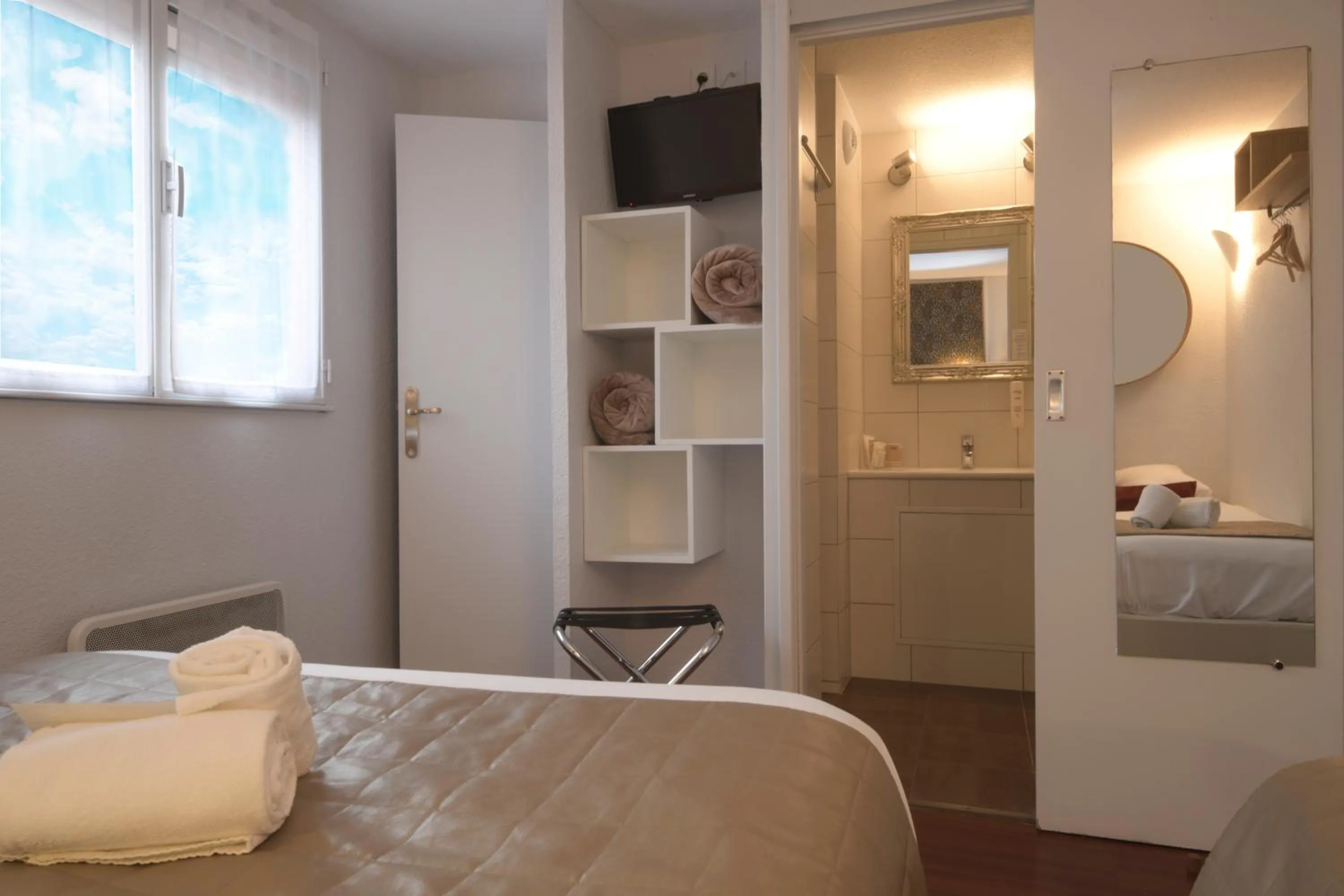 Photo of the whole room, Bed in Hotel Arc-En-Ciel Colmar Contact Hotel