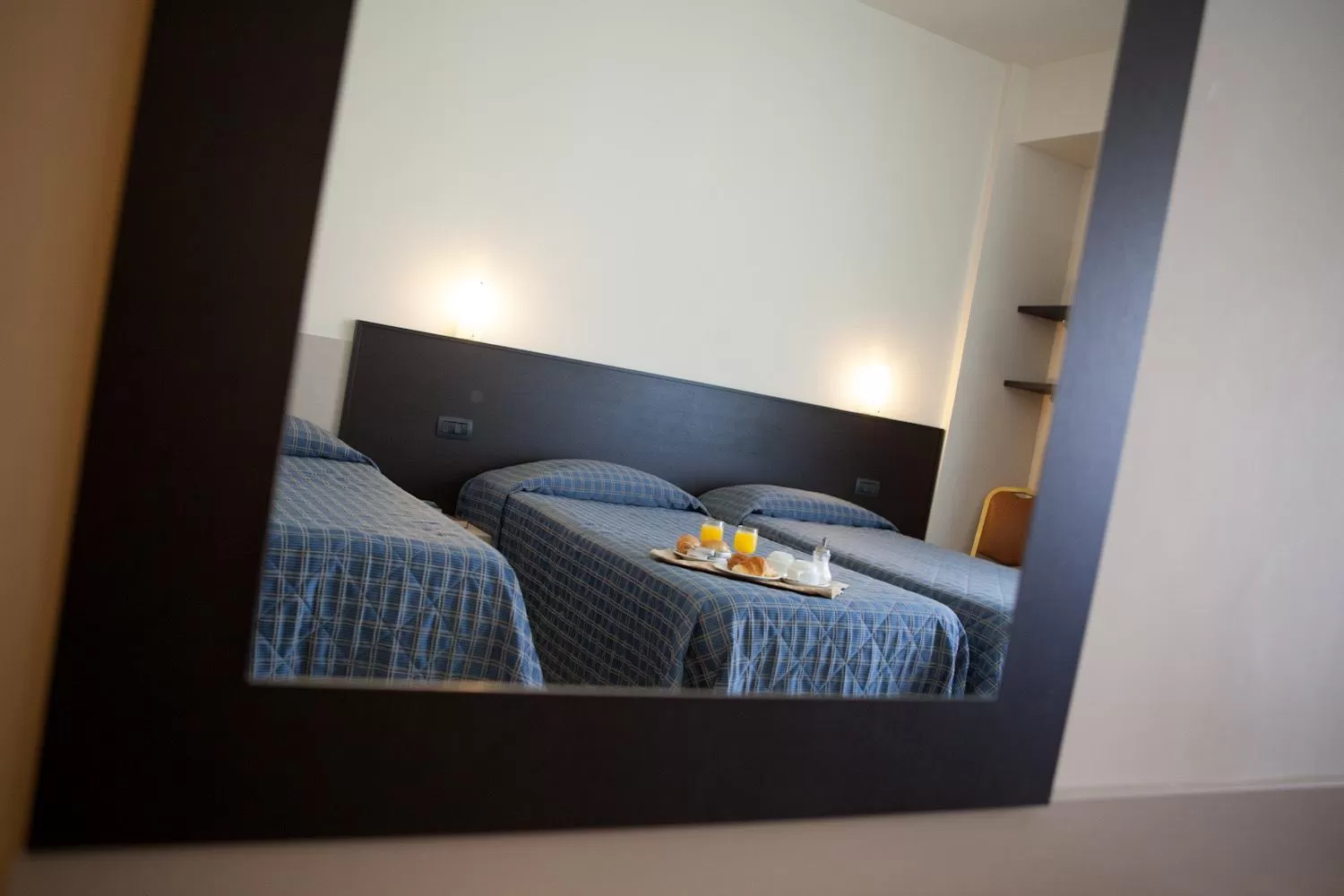 Bed in AUTO PARK Hotel