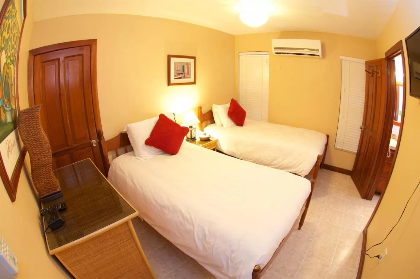 Bed in The Palms Oceanfront Suites