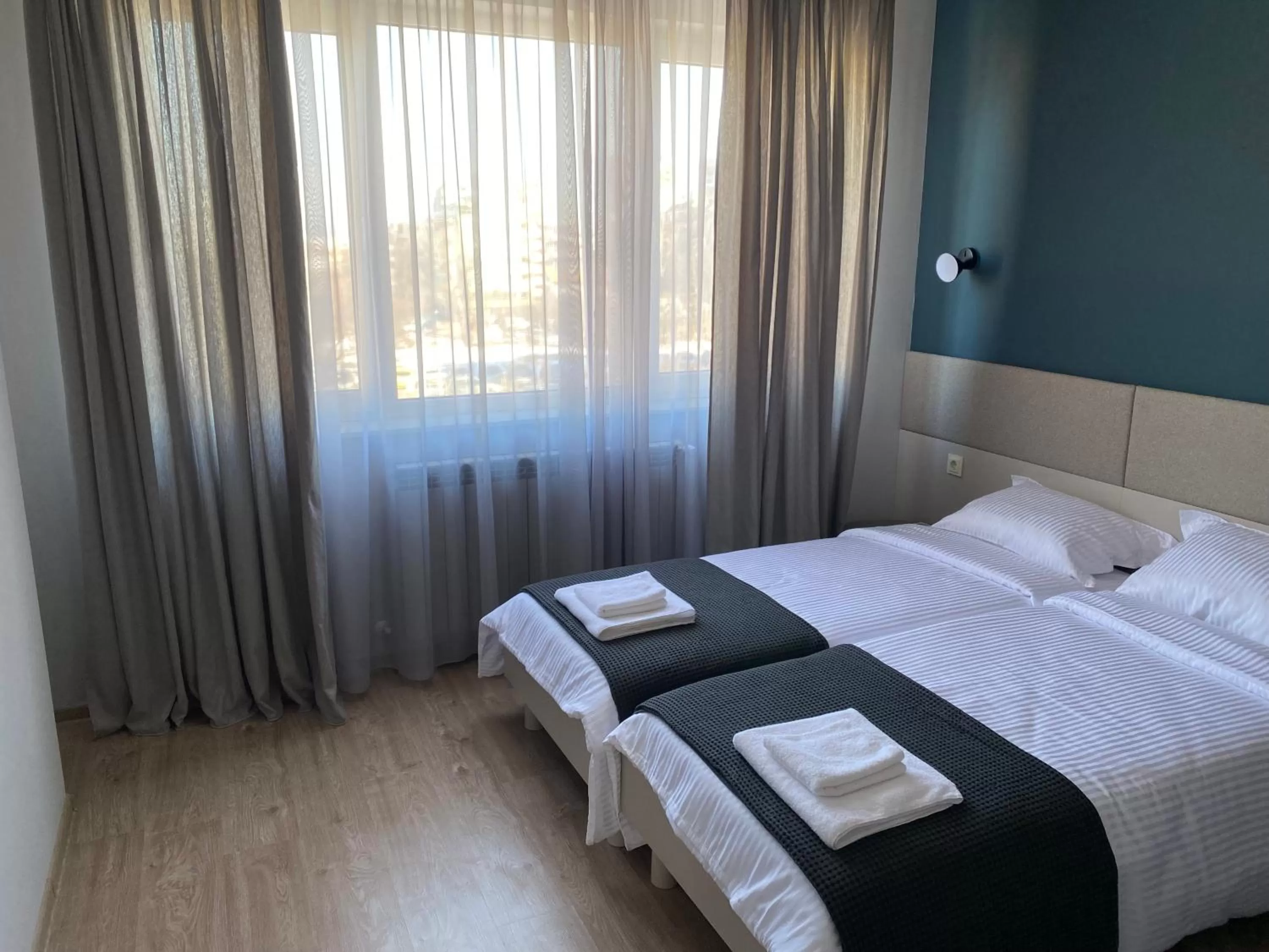 Bed in 7th Sense boutique apartments