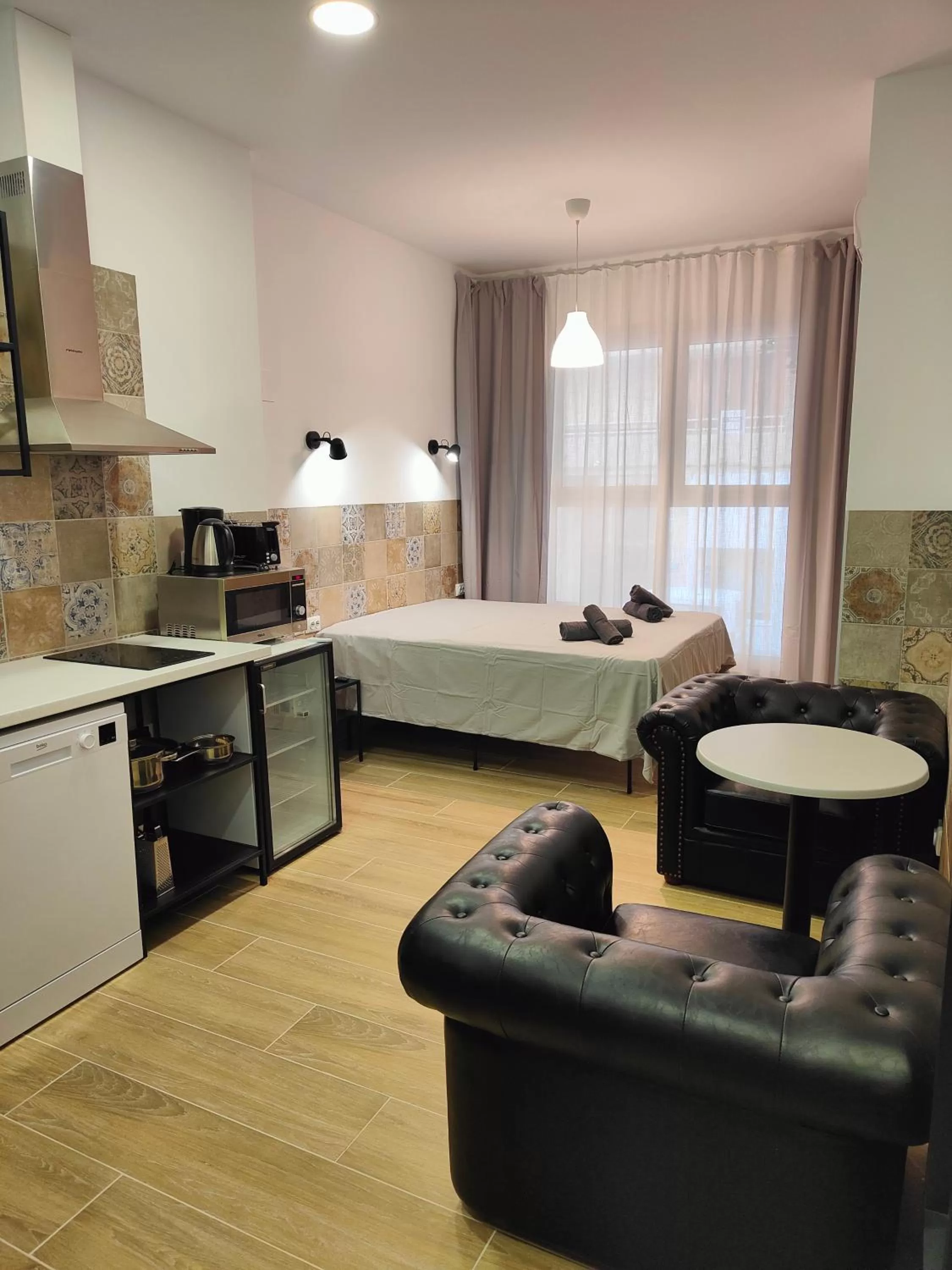 Seating area, Bed in Hotel Apartamentos Pueblo Mar