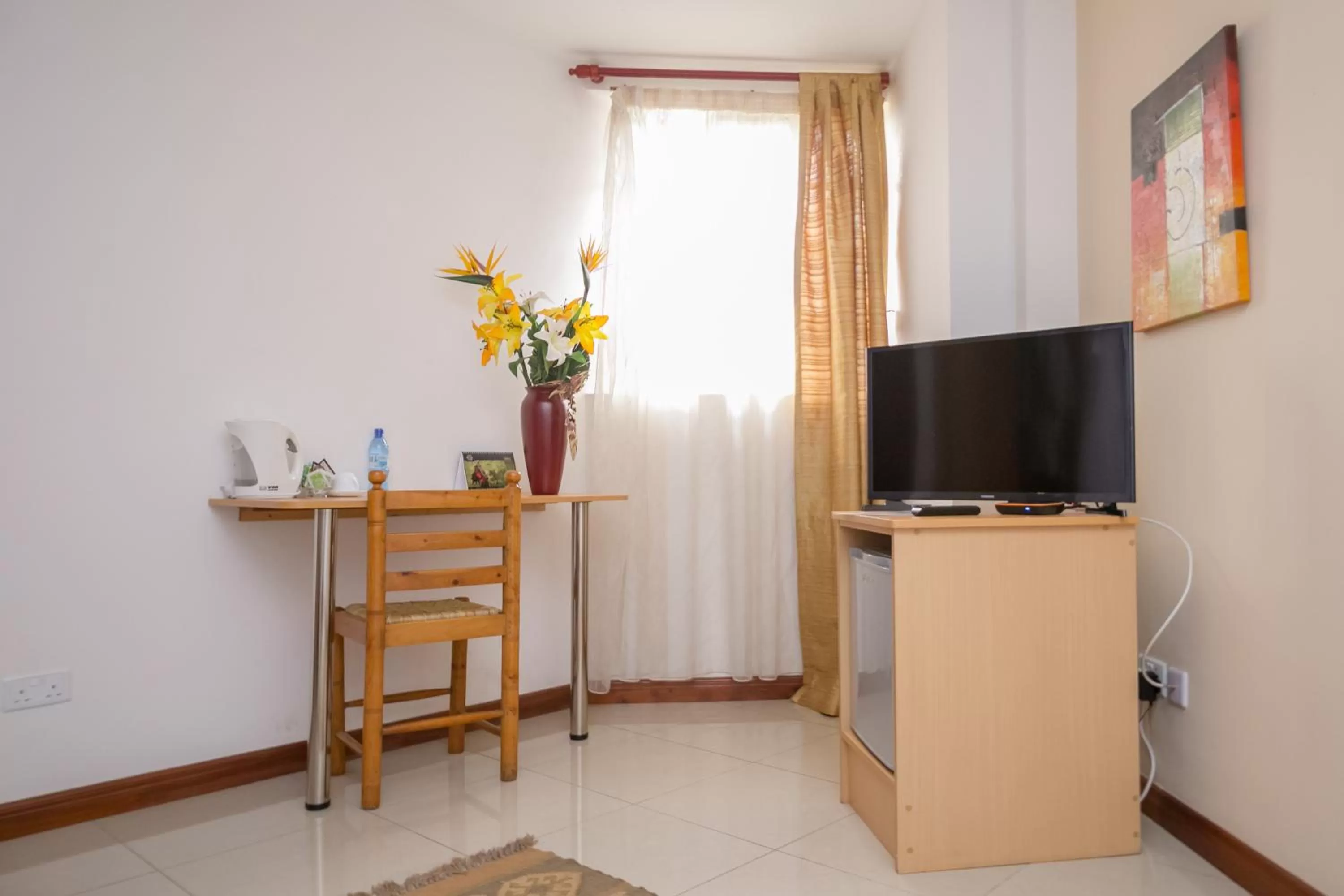 TV and multimedia, TV/Entertainment Center in Hotel Rudi