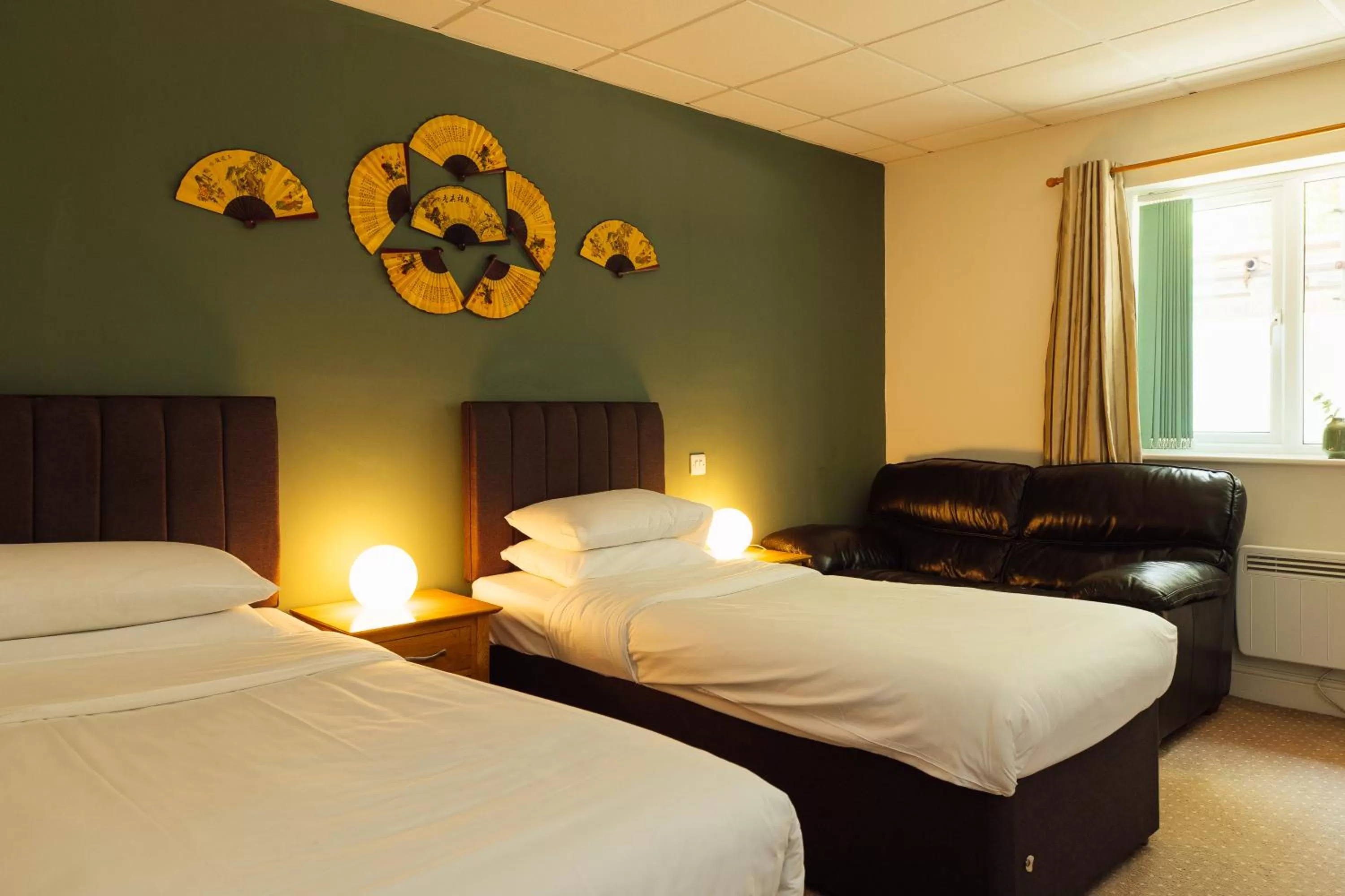 Bed in The Imperial Dragon Hotel