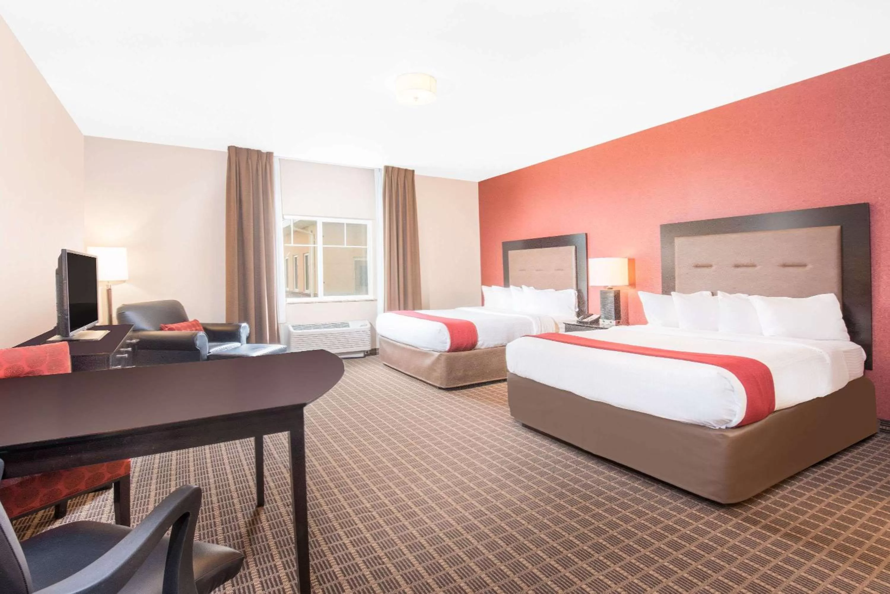 Photo of the whole room, Bed in Hawthorn Extended Stay by Wyndham Dickinson