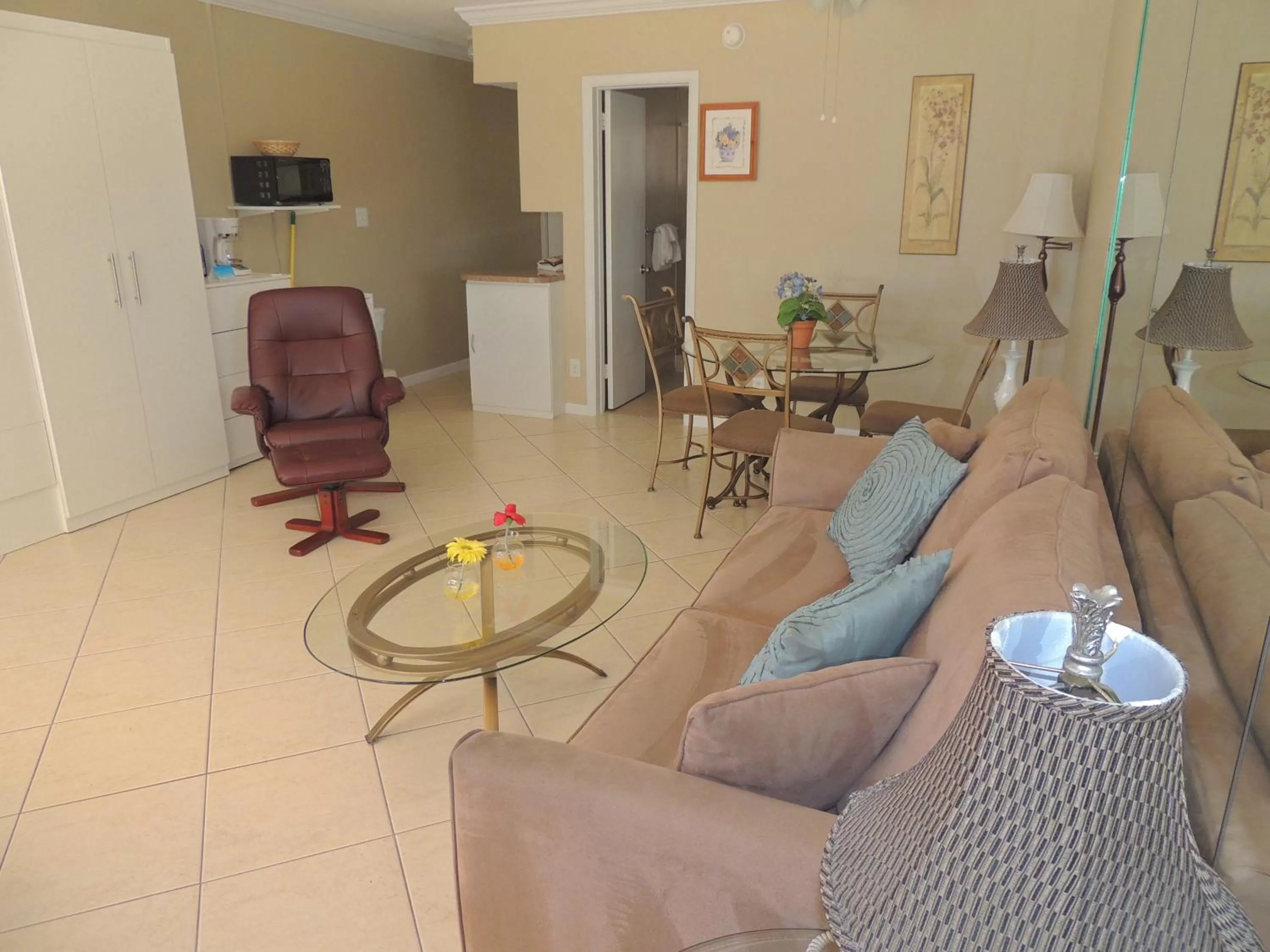 Bed, Seating Area in Aqua Mar Condos