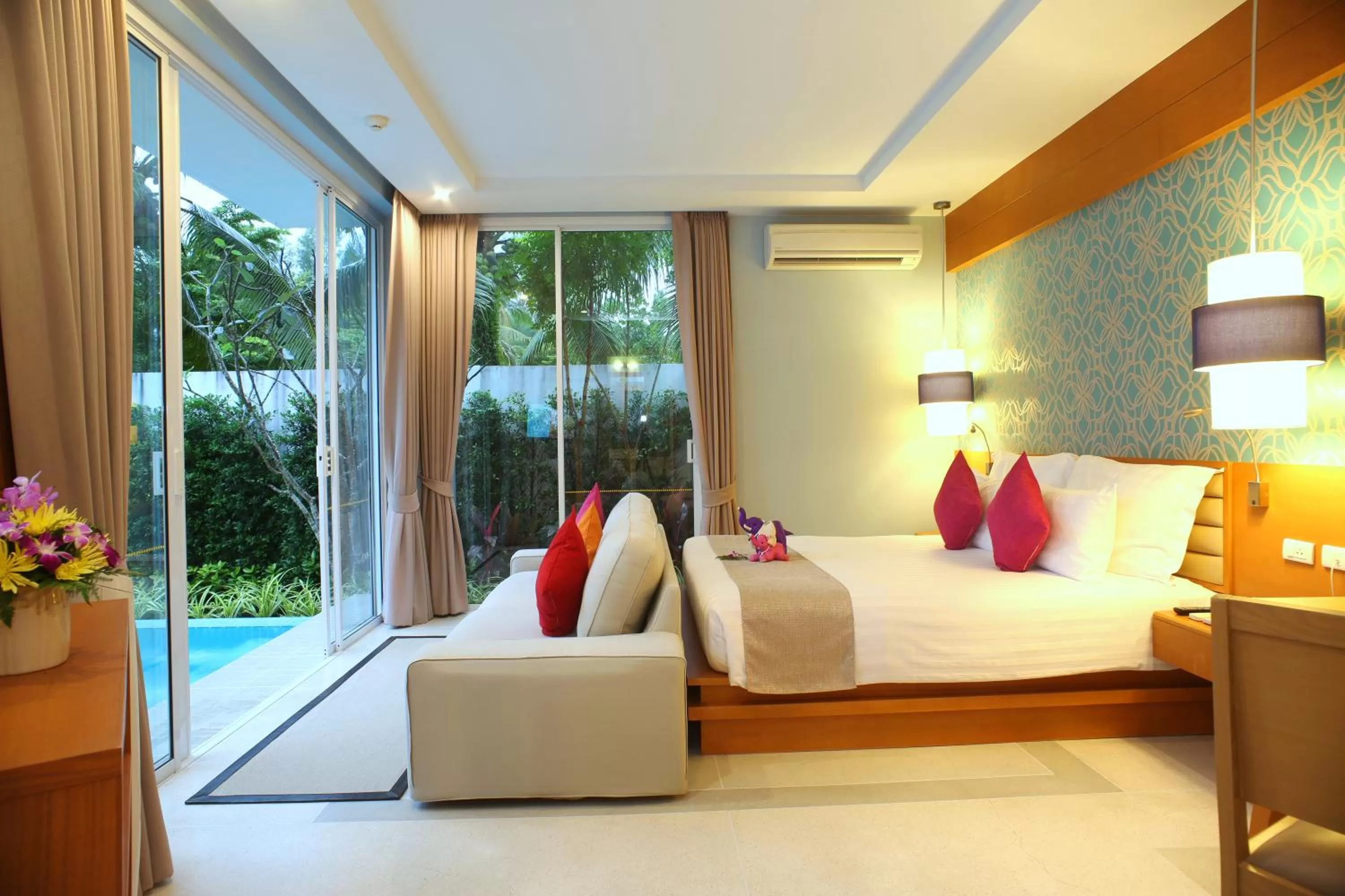 Seating area, Bed in Apsara Beachfront Resort & Villa