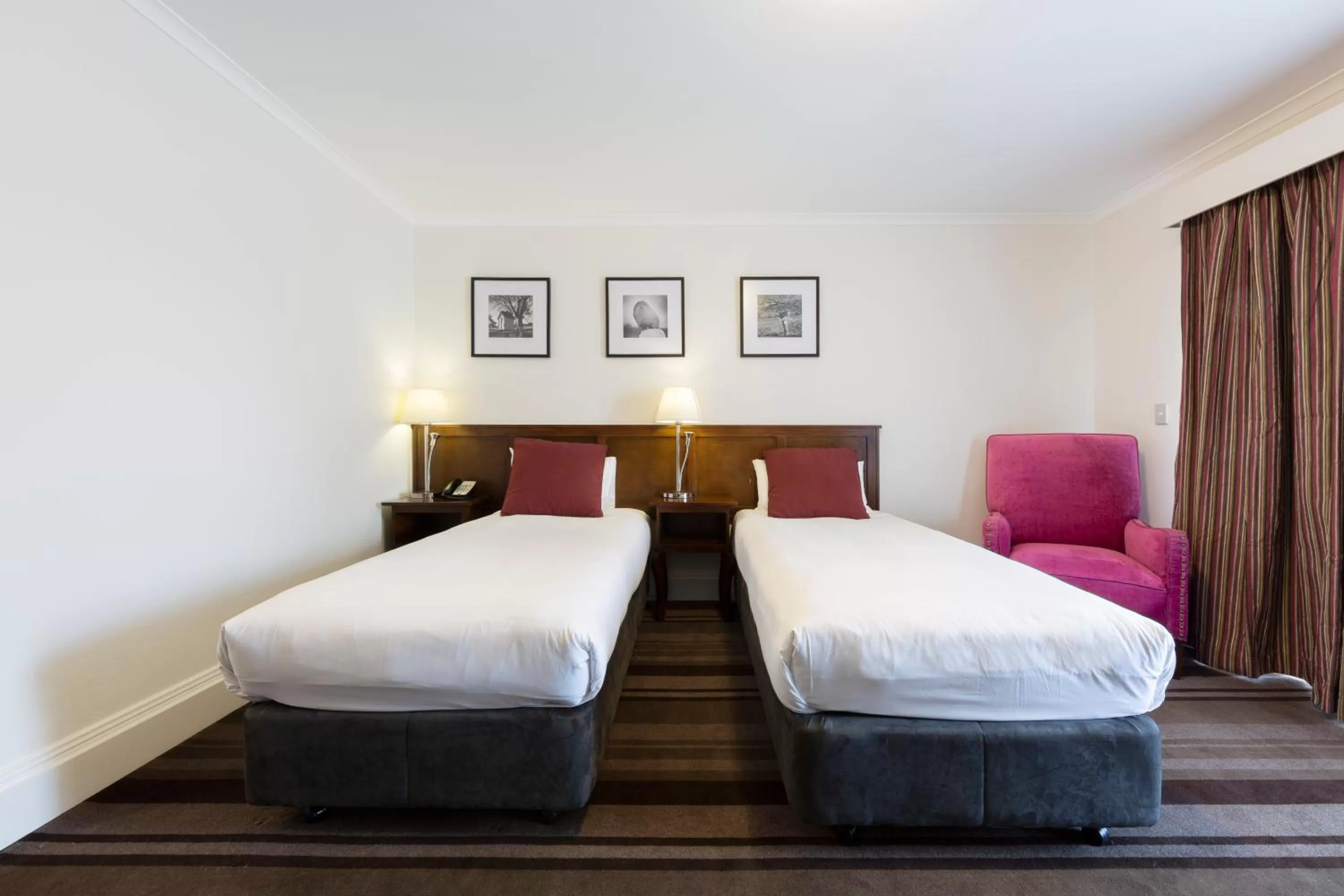 Bed in Mercure Canberra