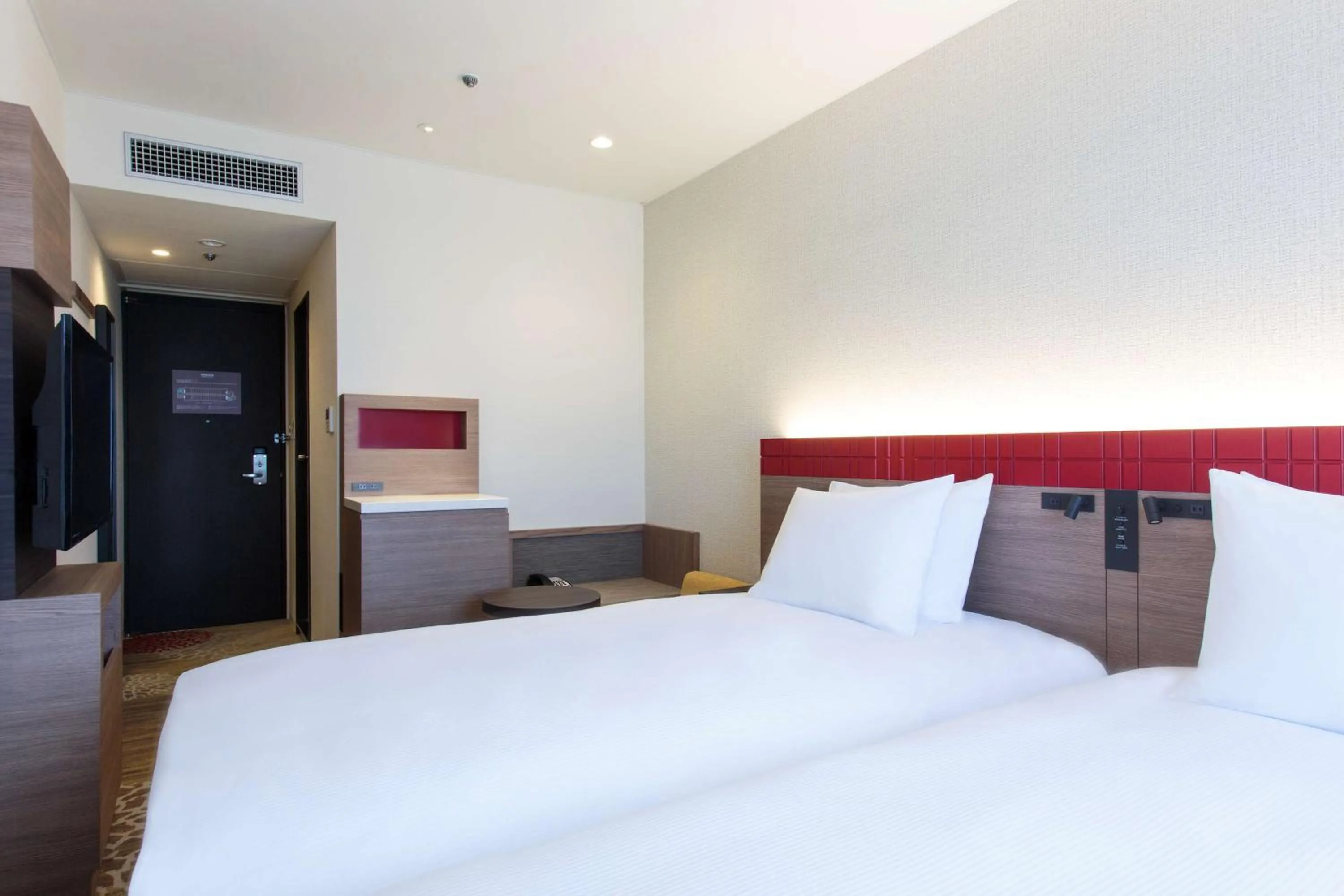 Photo of the whole room, Bed in DoubleTree by Hilton Naha Shuri Castle