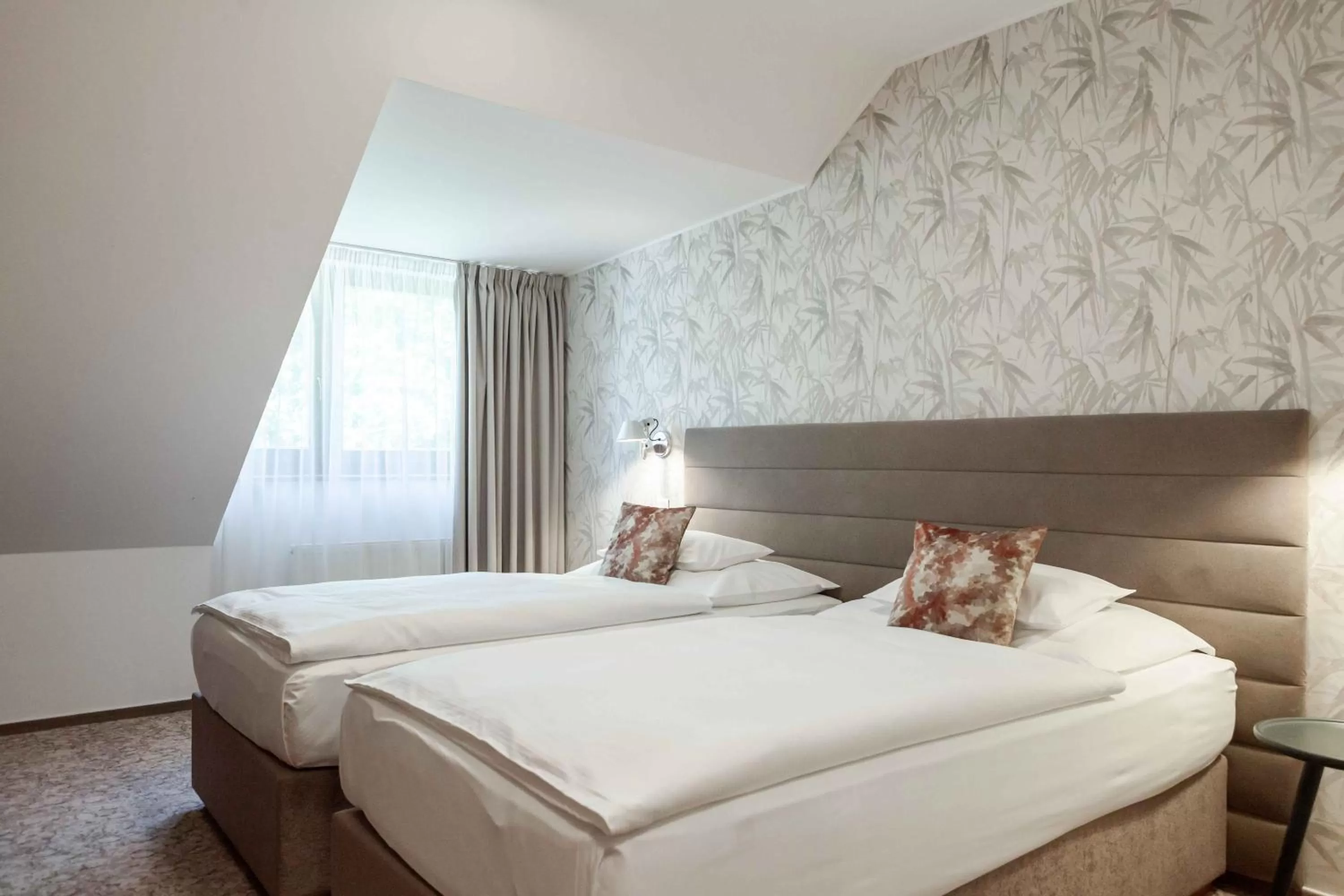 Bed in Equitana Hotel Resort