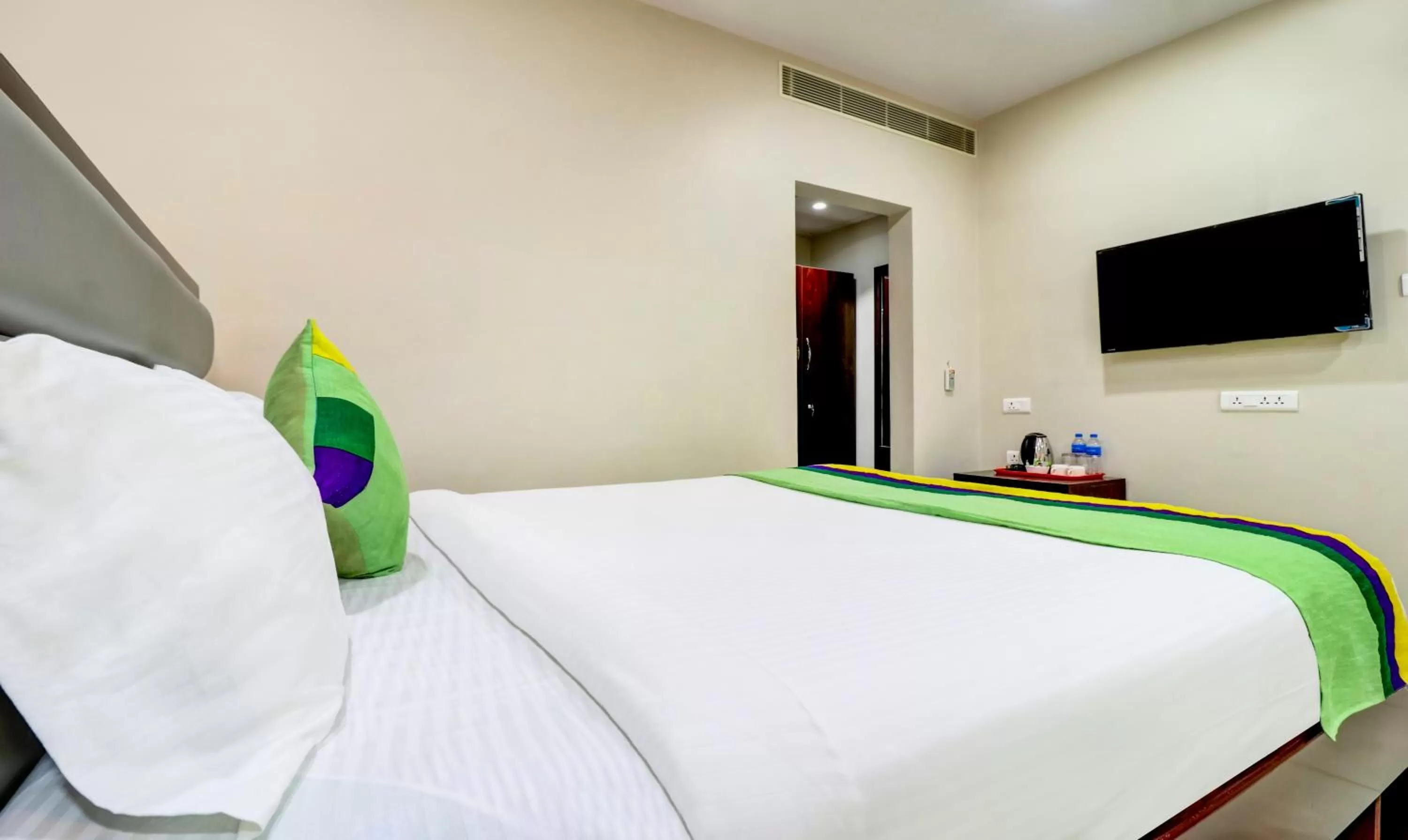 Bedroom, Bed in Treebo Grand Milan