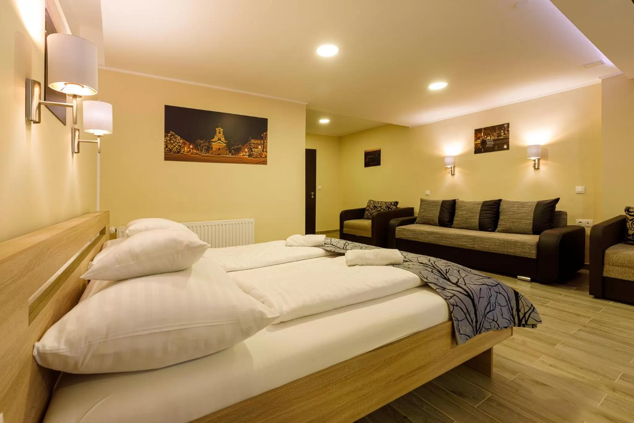 Bed in Central Panzió Gyula