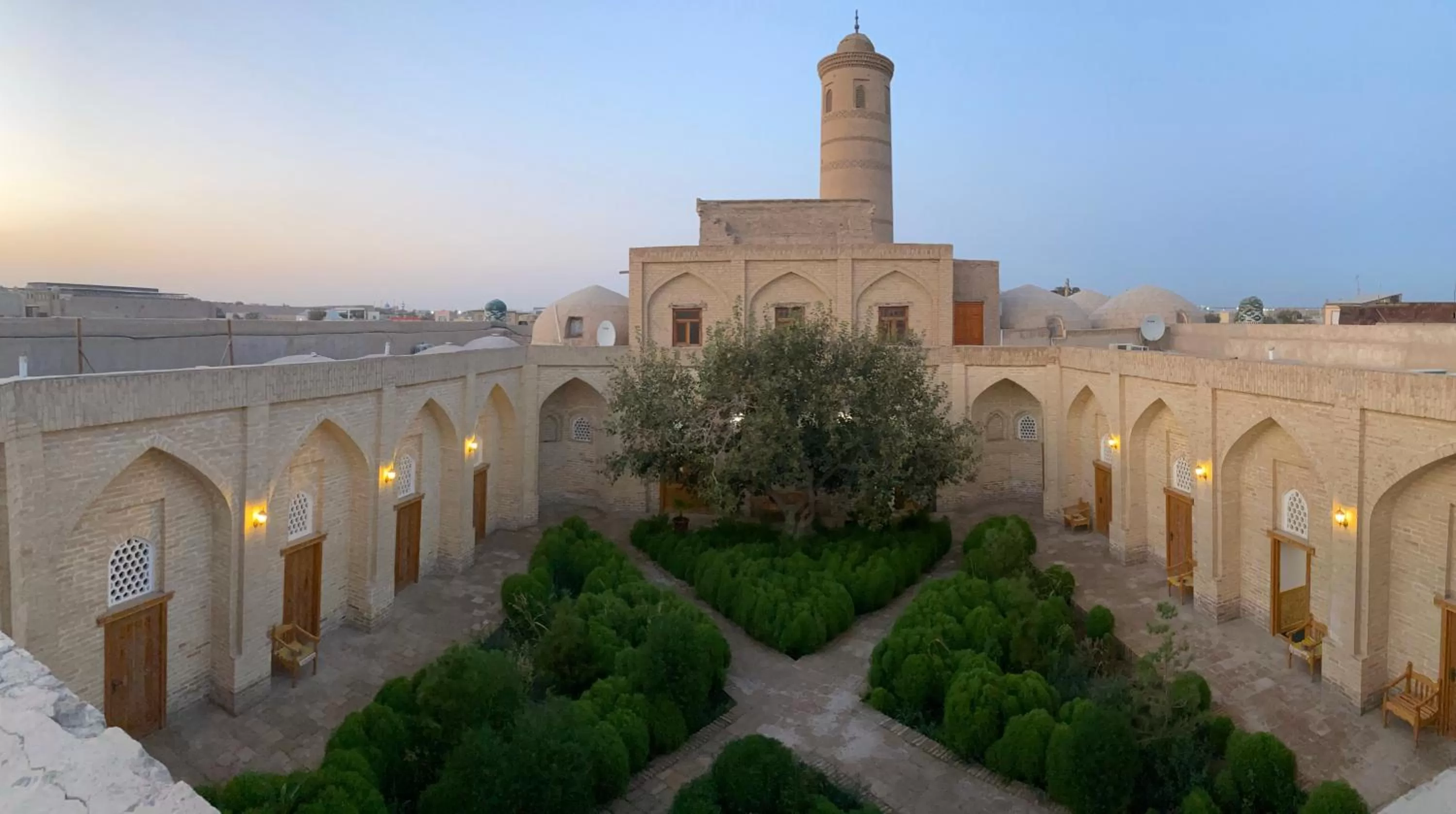 Inner courtyard view in madrasah Polvon-Qori boutique hotel