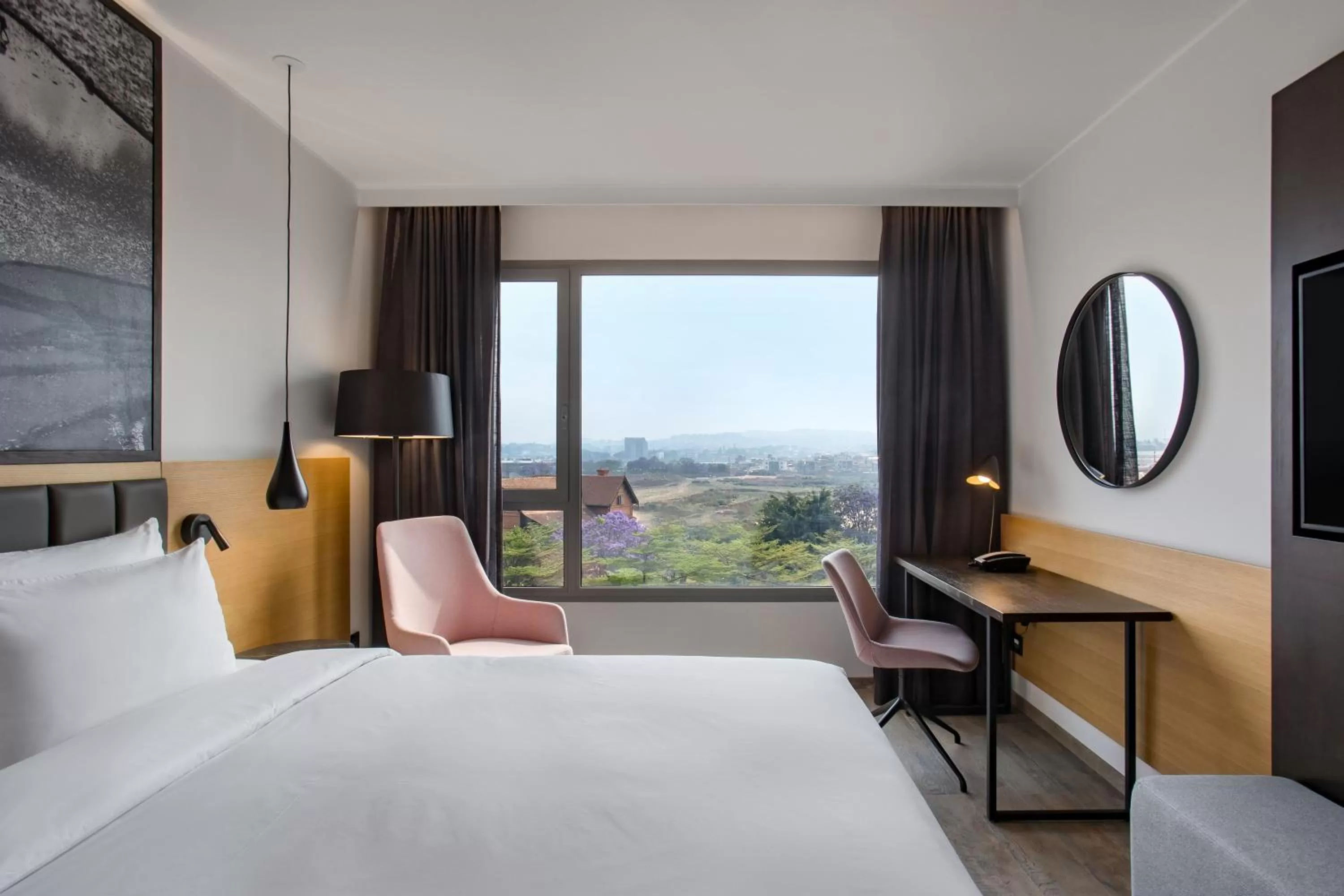 Photo of the whole room, Bed in Radisson Blu Hotel Antananarivo Waterfront