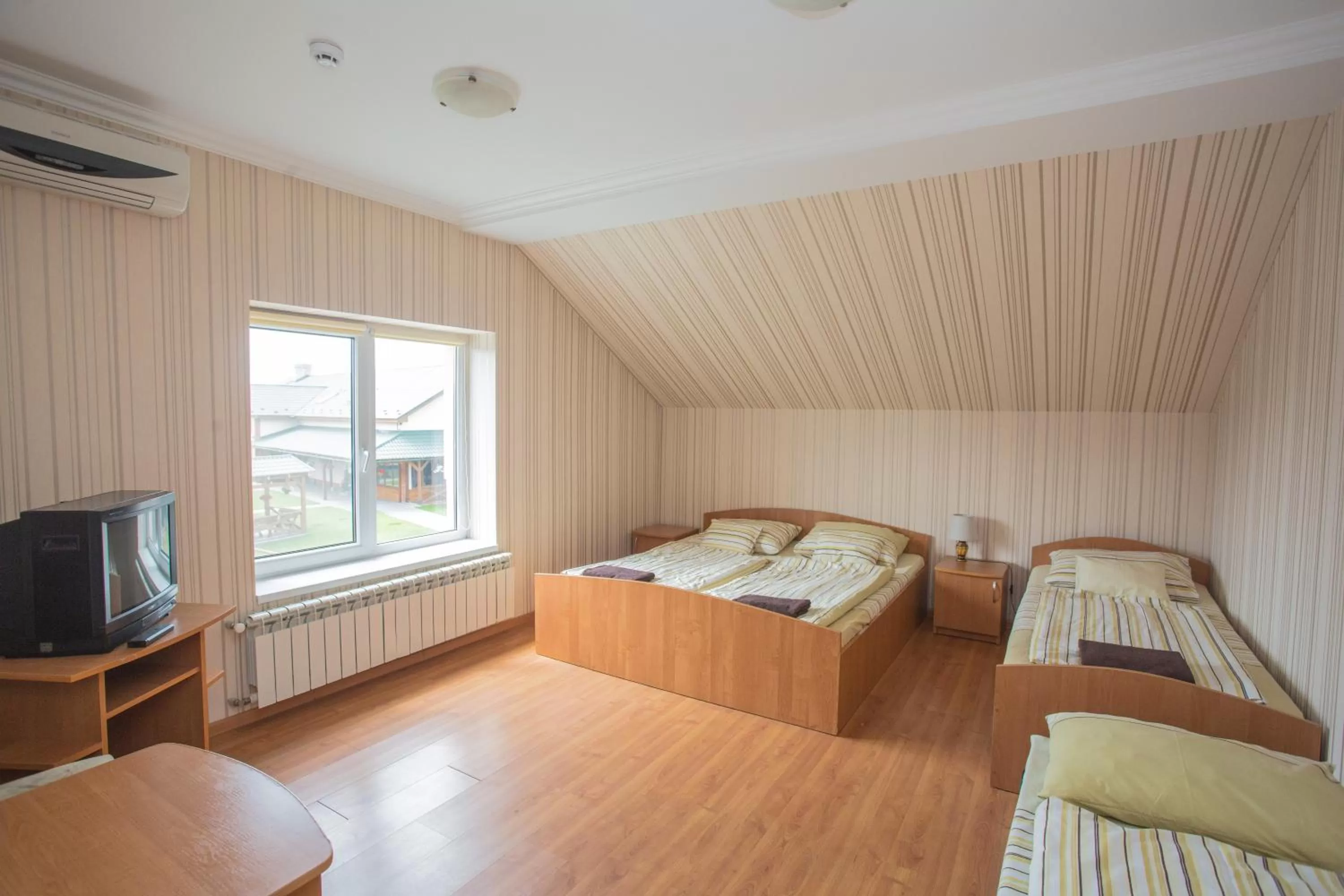 Photo of the whole room, Bed in Praktik Hotel & Restaurant