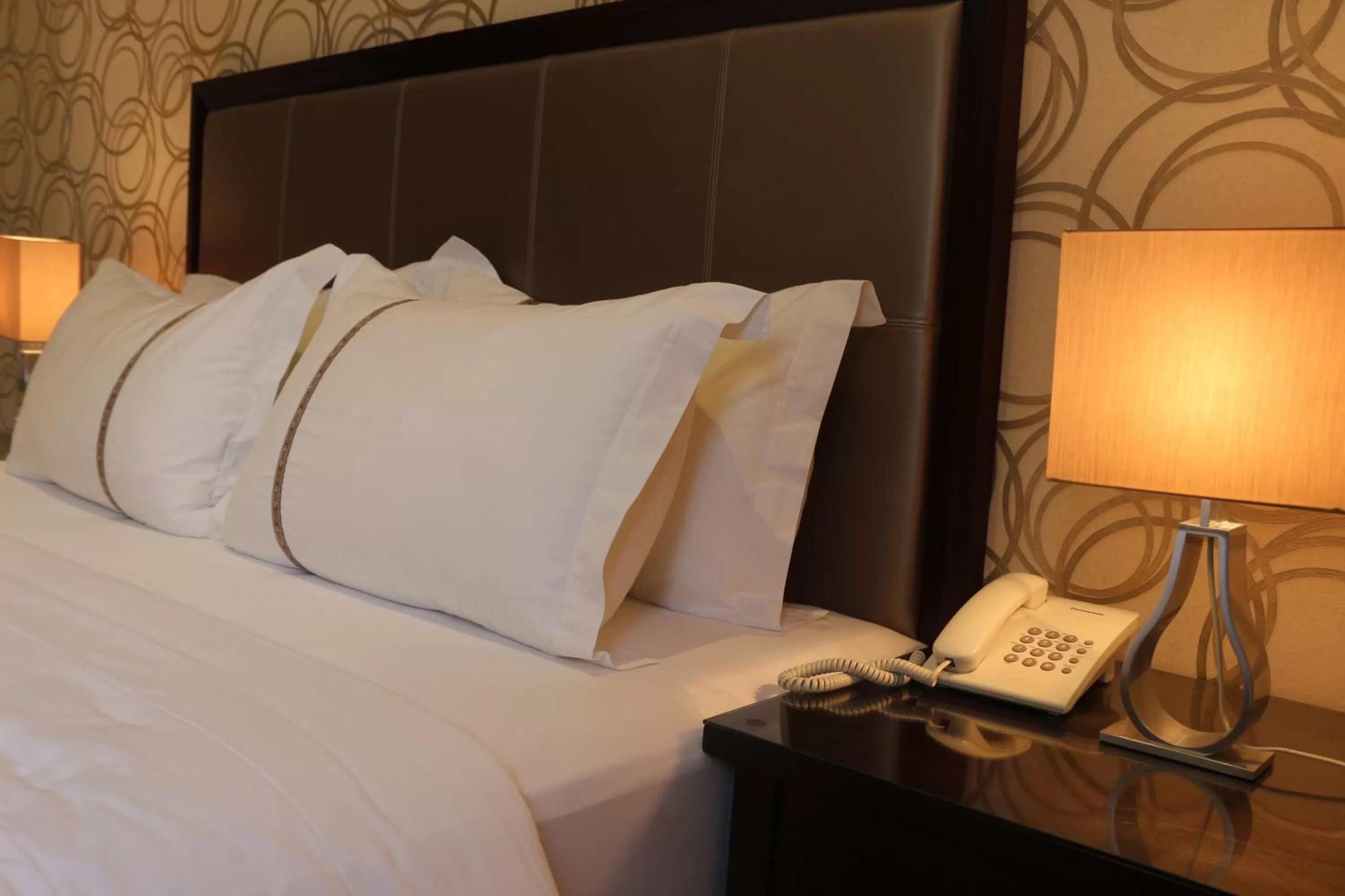 Decorative detail, Bed in Nooryana Suites and Apartments