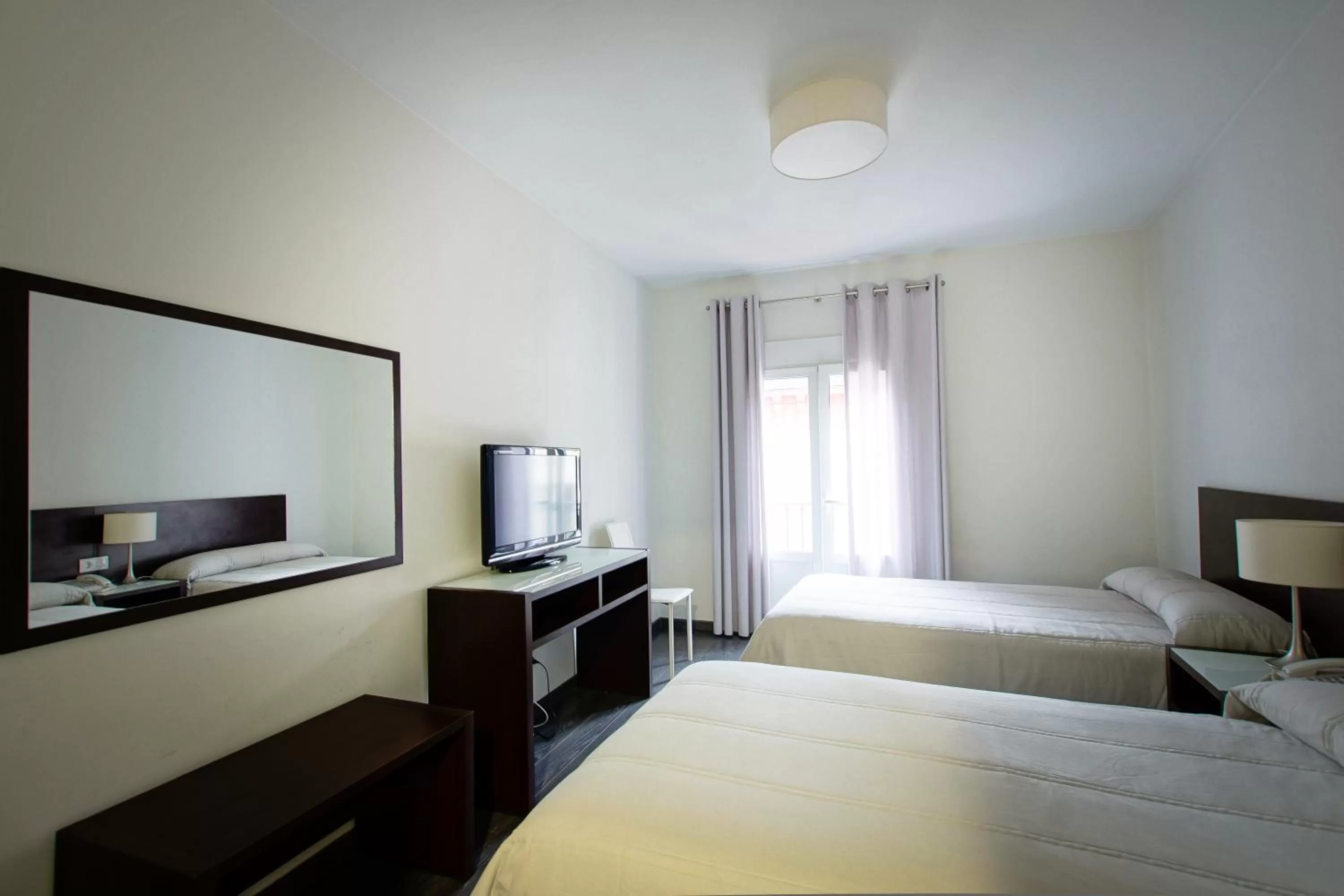 Photo of the whole room, Bed in Hotel Madrid de Sevilla by SHS