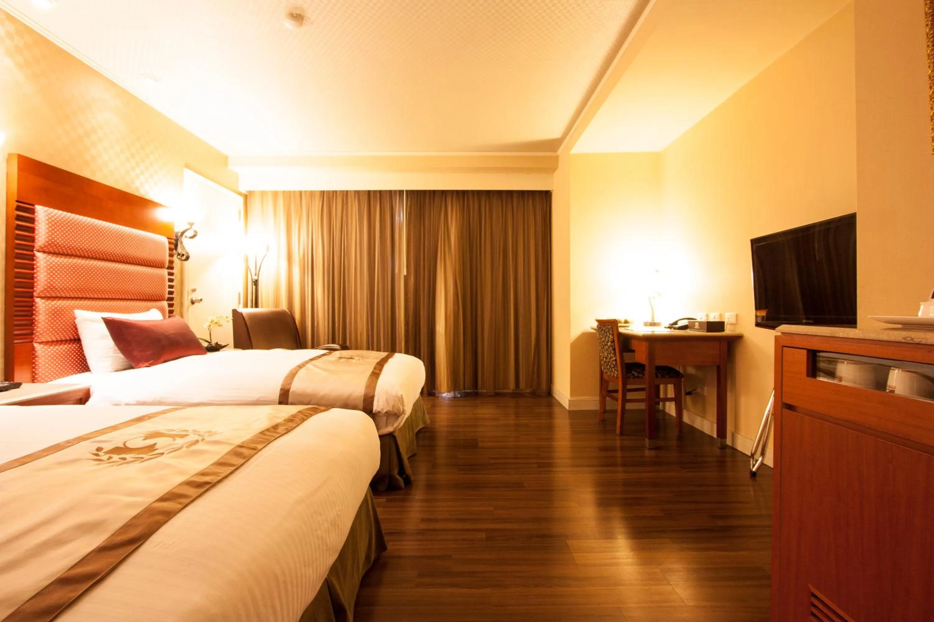 Bed in Hualien Charming City Hotel