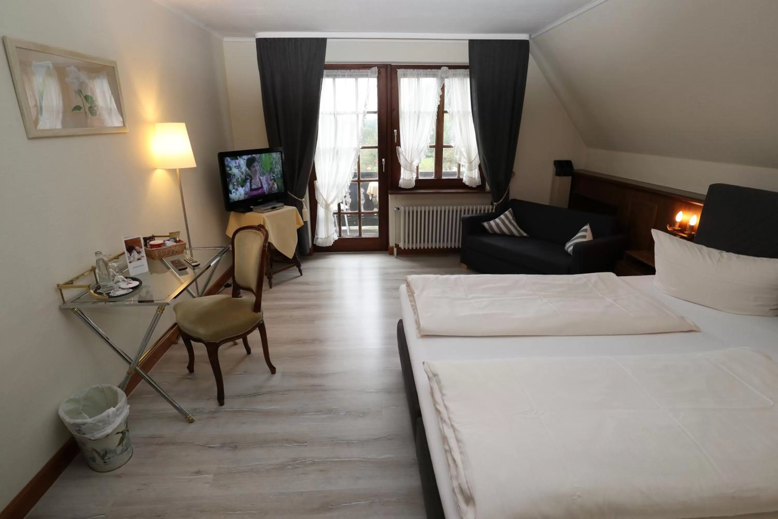 Photo of the whole room, Bed in Schwarzwaldhotel Stollen