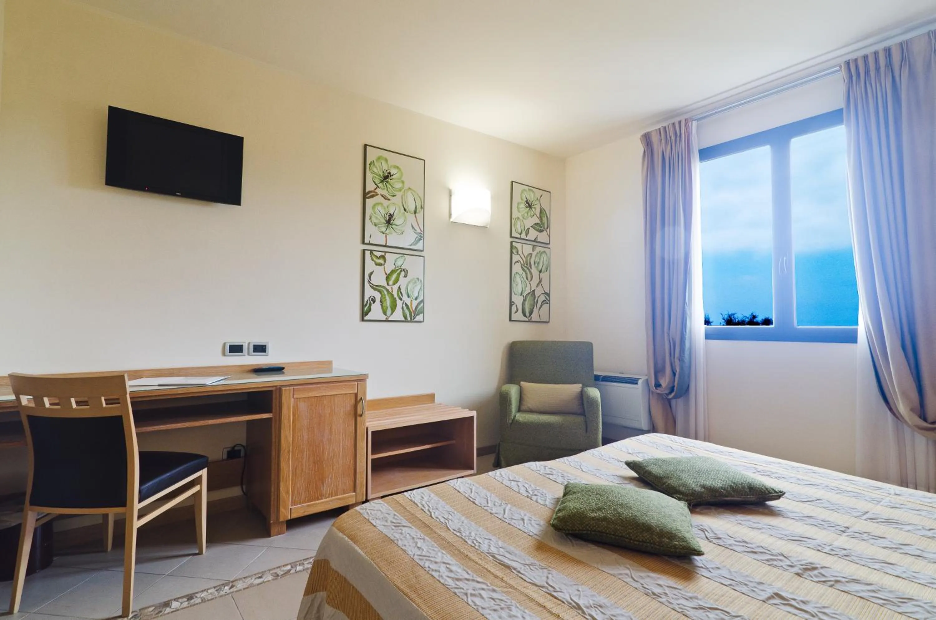 Bedroom in Castellaro Golf Resort