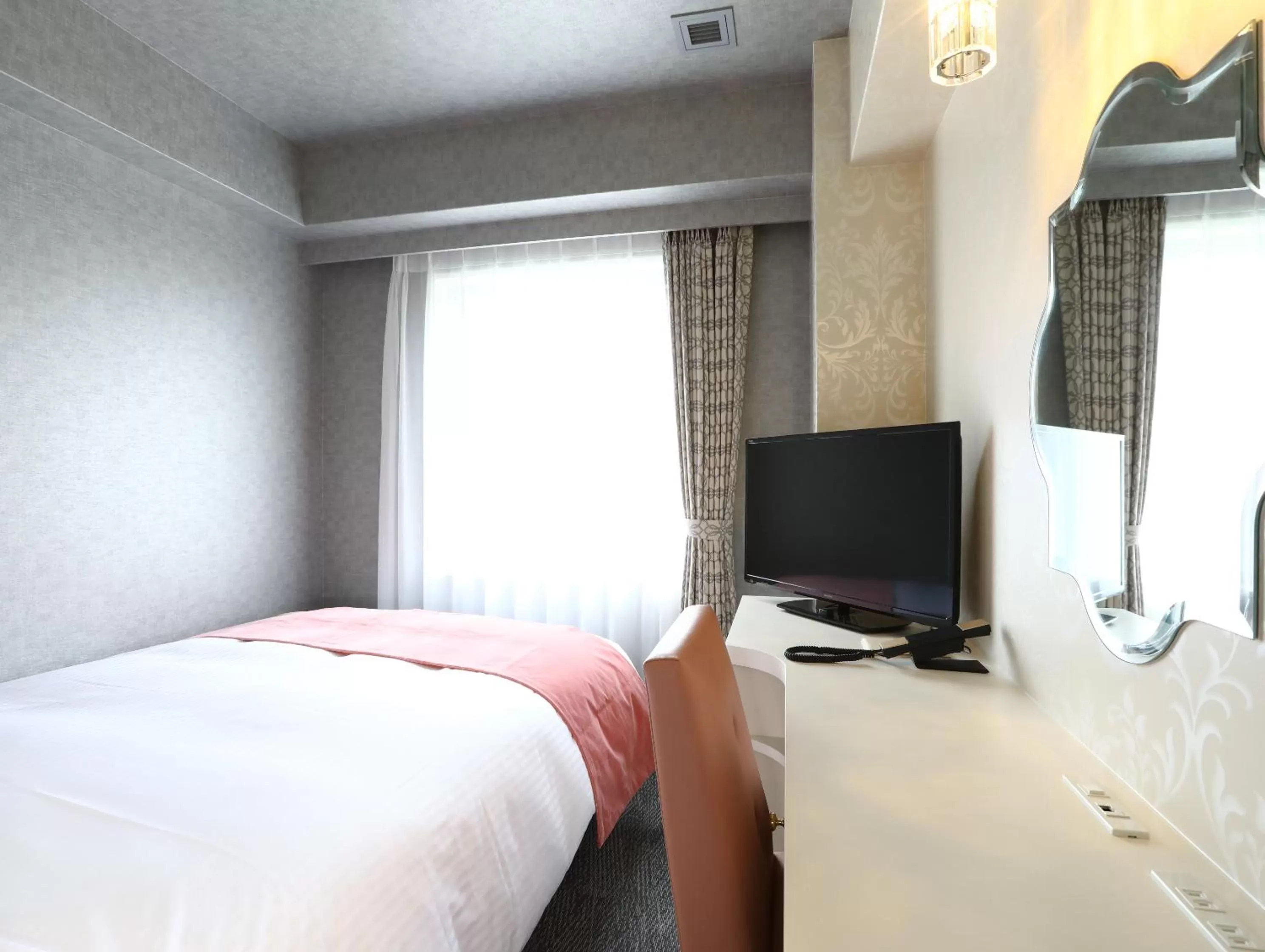 Bed in Hotel Wing International Select Osaka Umeda