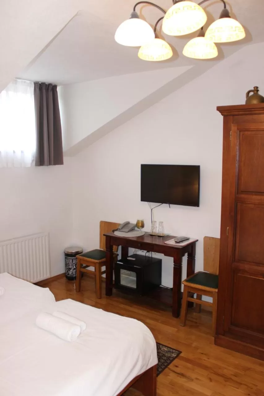 Photo of the whole room, TV/Entertainment Center in Wellness B&B Winery Sontacchi