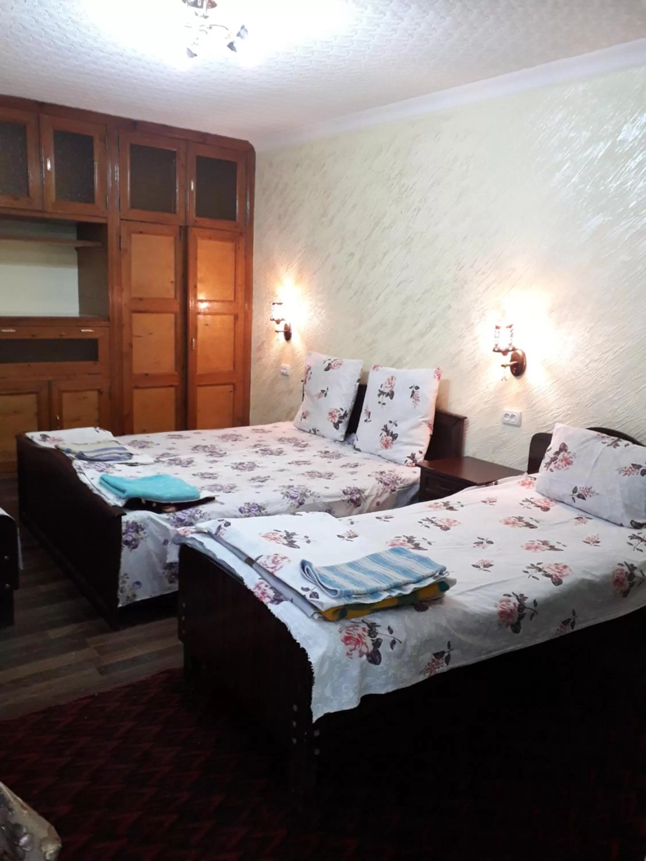 Bed in B&B Bahodir