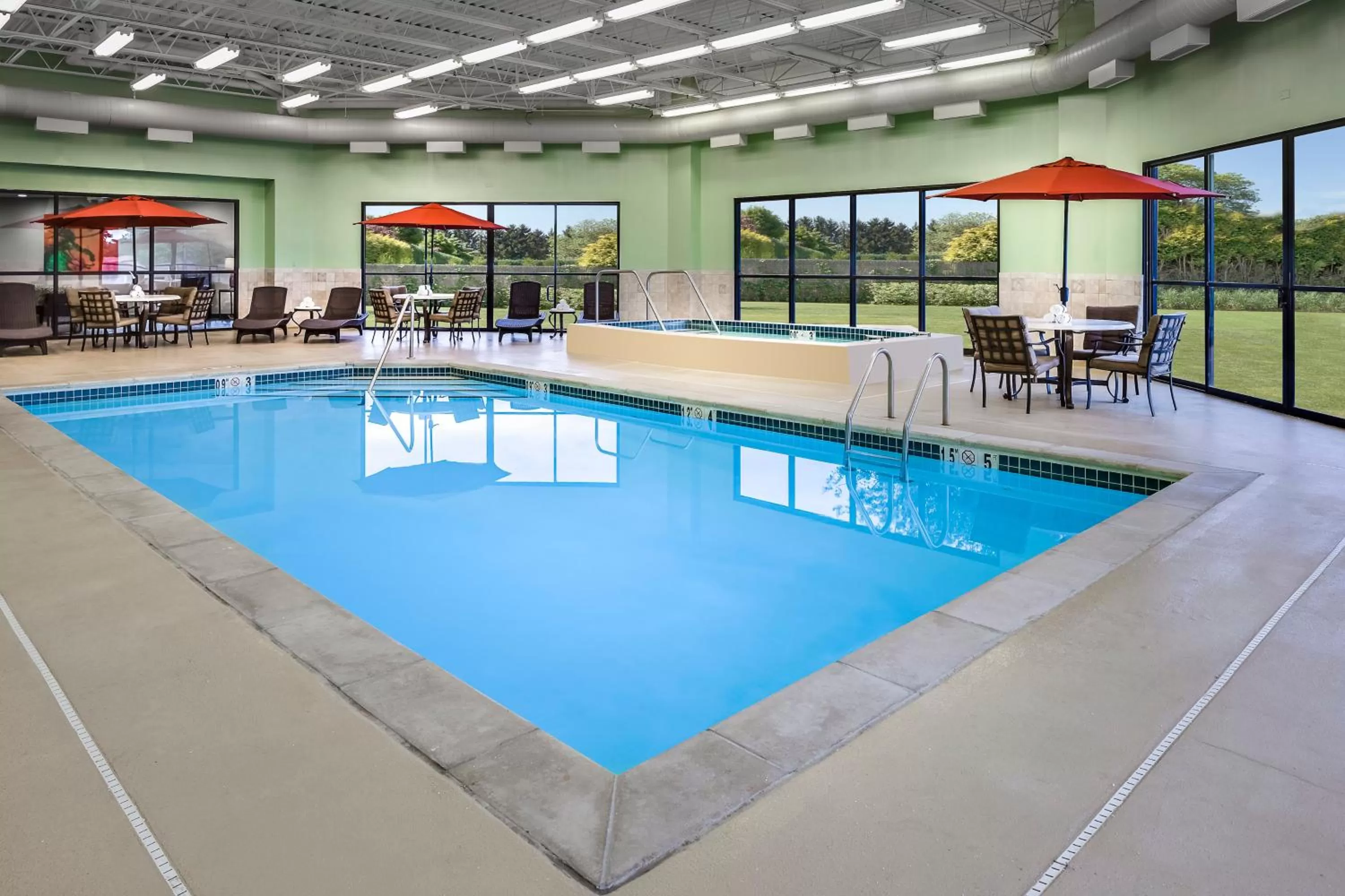 Swimming pool in Holiday Inn Wichita East I-35 by IHG
