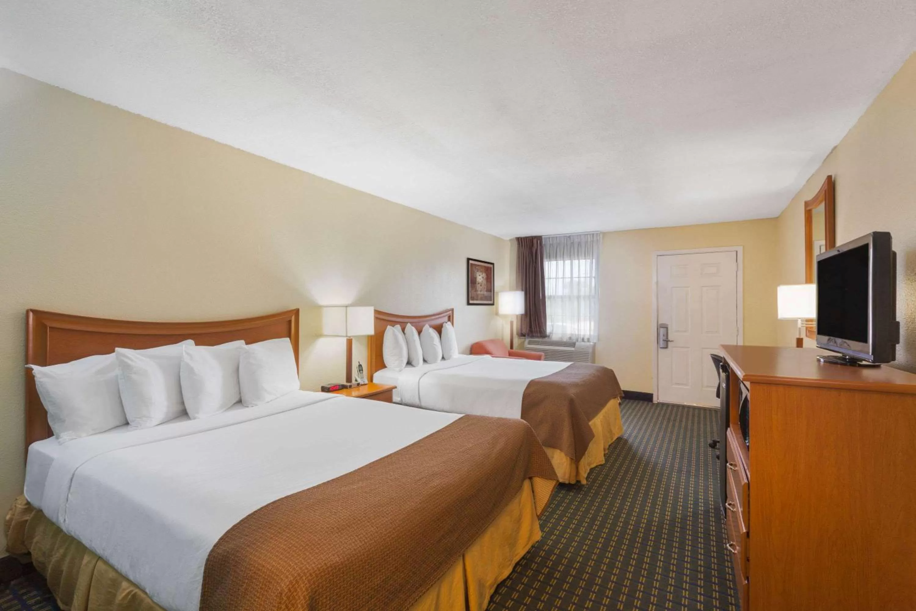 Deluxe Business Queen Room with Two Queen Beds - Non-Smoking in Days Inn by Wyndham Natchitoches