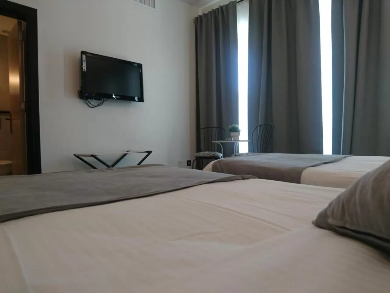 TV and multimedia, Bed in The Conroy Boutique Hotel