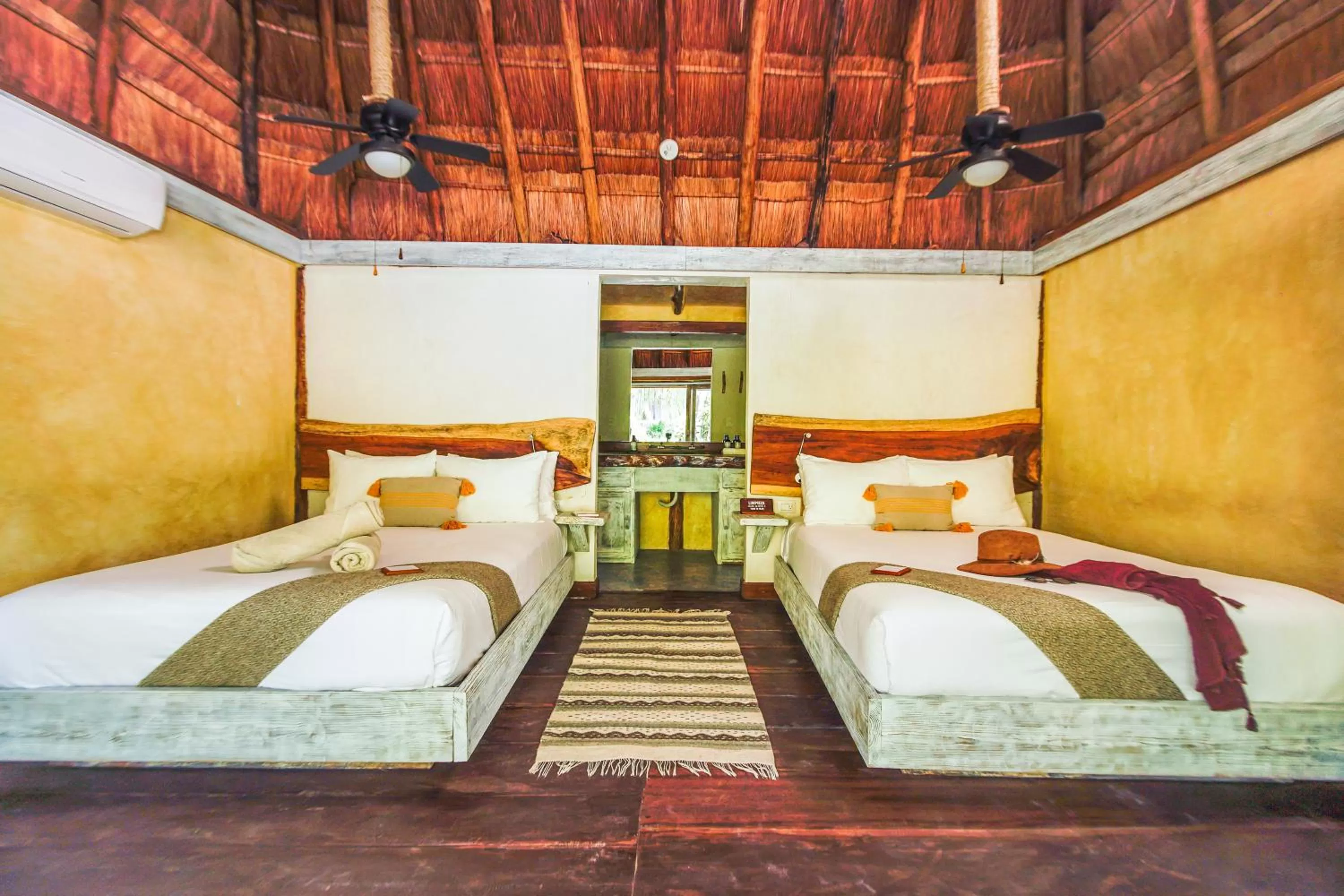 Bedroom, Bed in Villa Pescadores Tulum-Beachfront hotel by Ahau Collection
