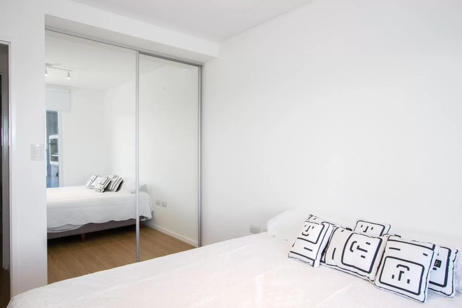 Bed in De la Costa Apartamentos