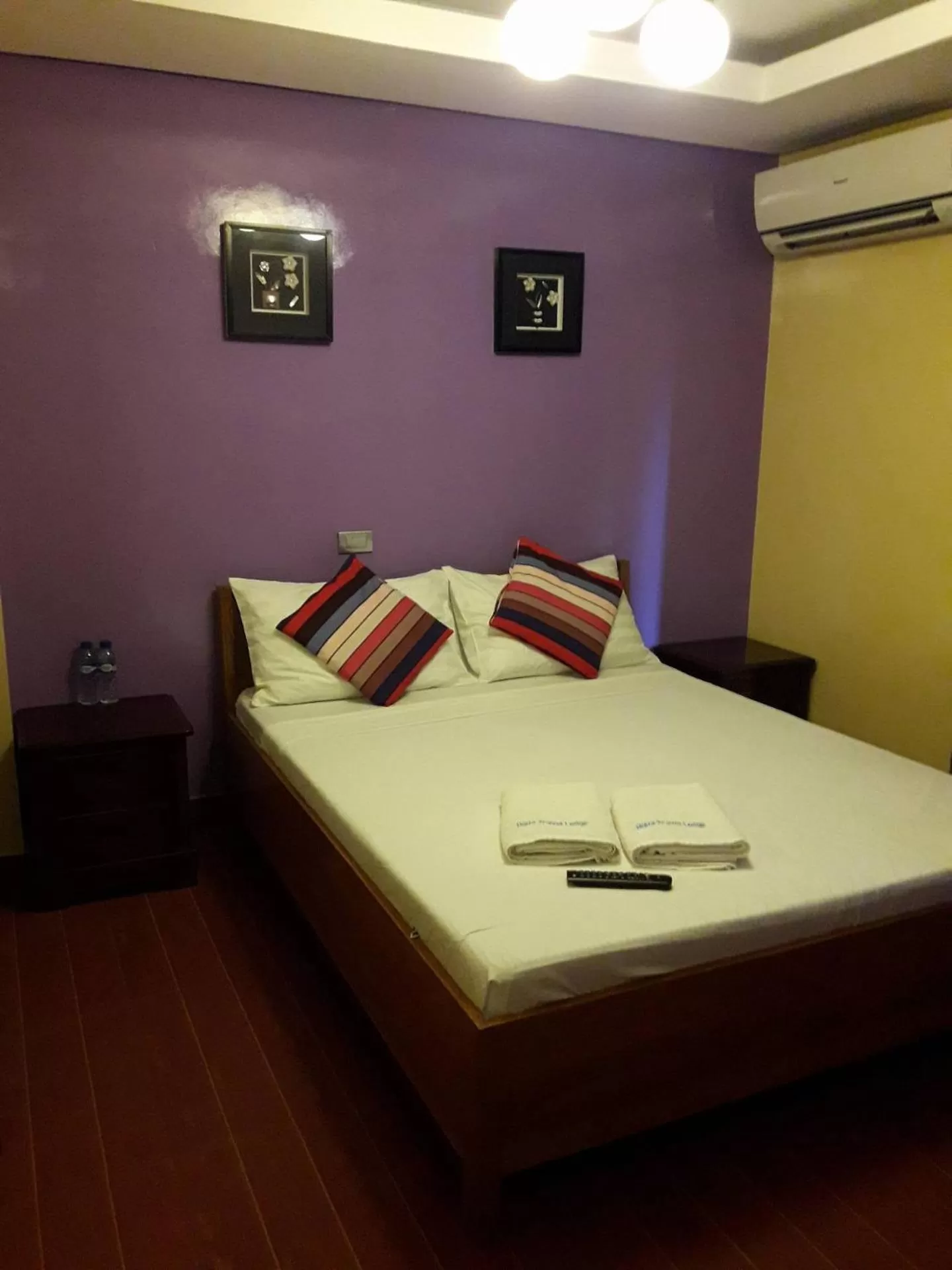 Bed in Aqua Travel Lodge