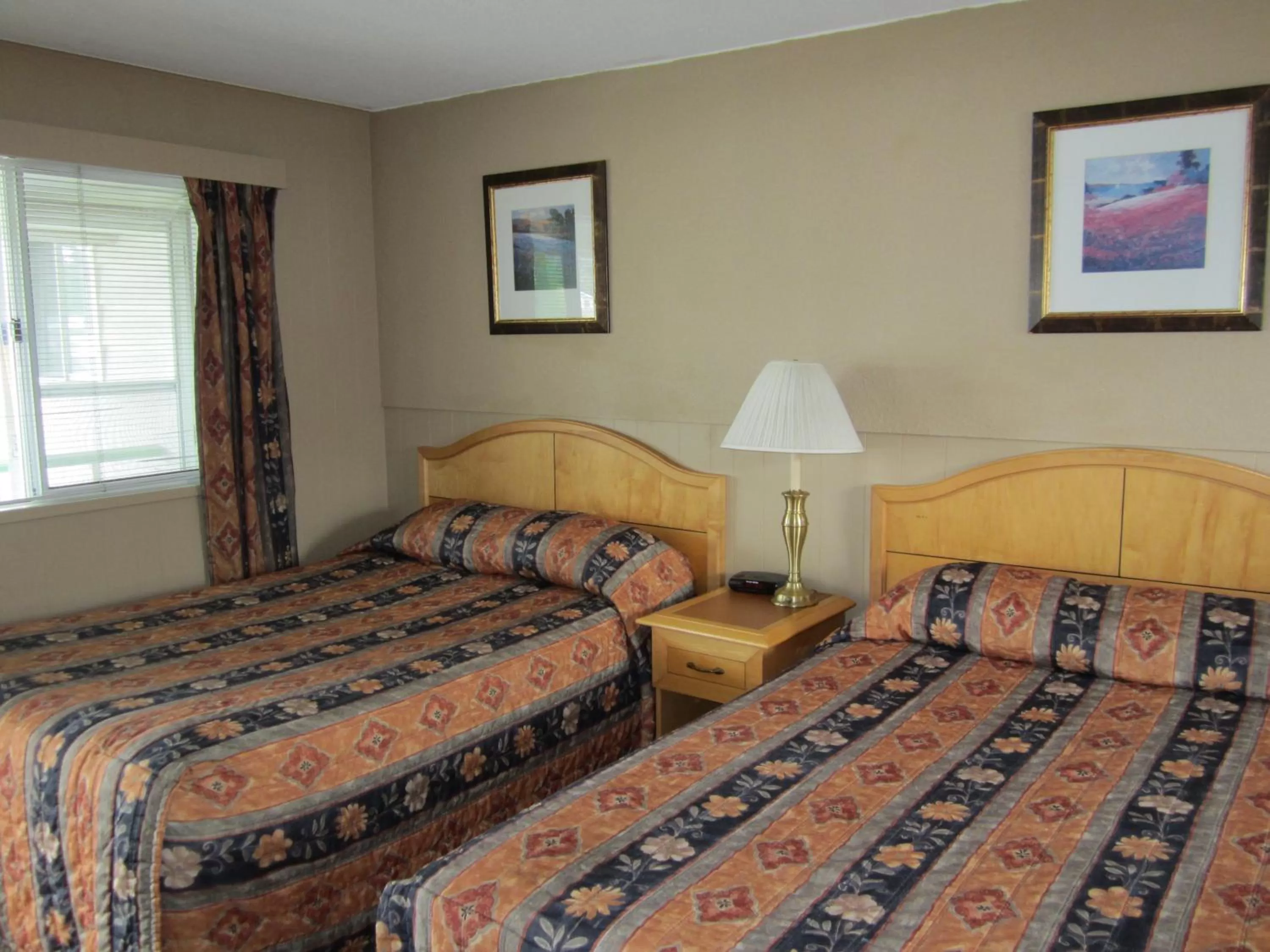 Bed in Bulkley Valley Motel