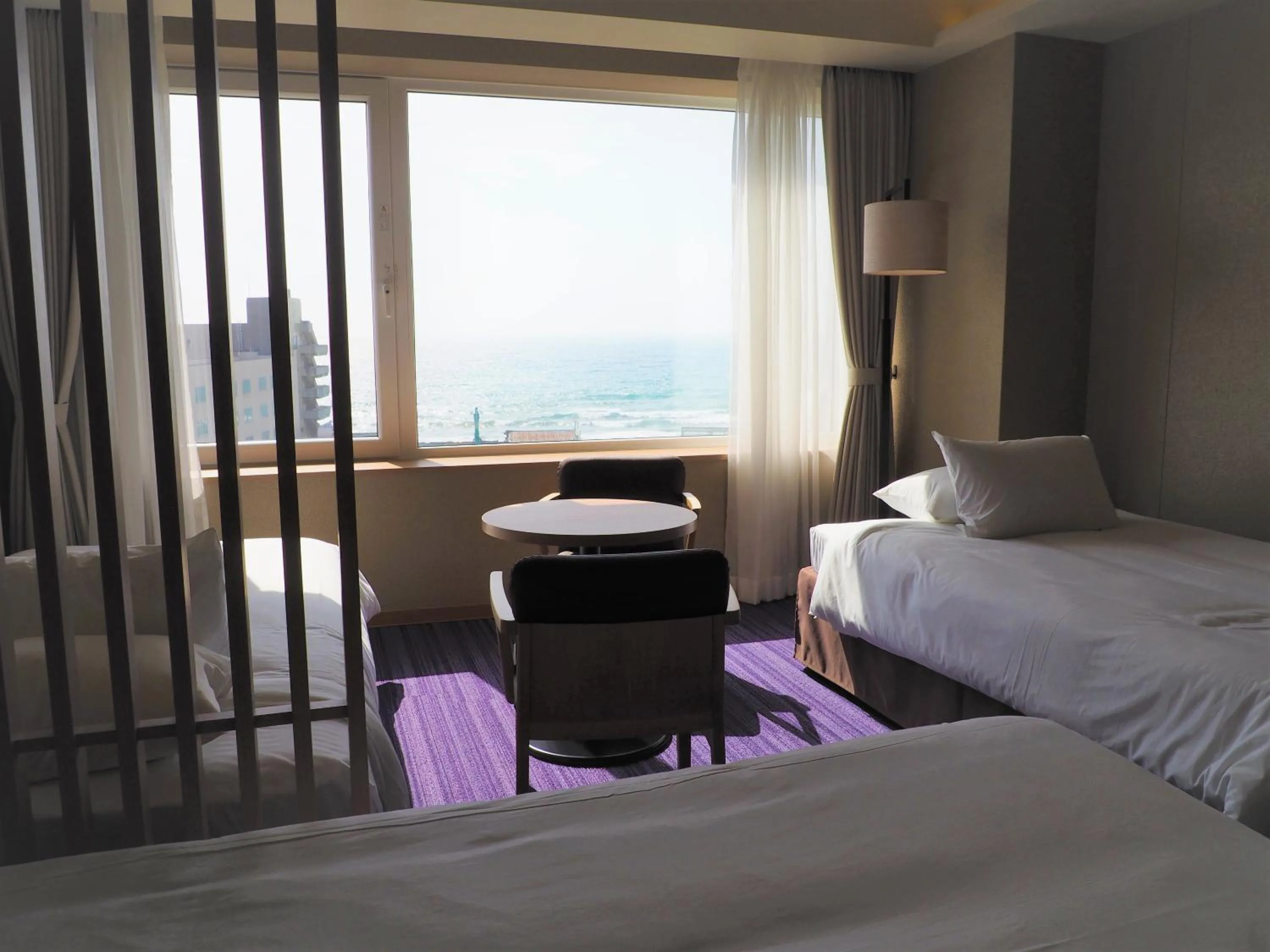 View (from property/room), Bed in Hakodate Yunokawa Onsen Umi to Akari Hewitt Resort