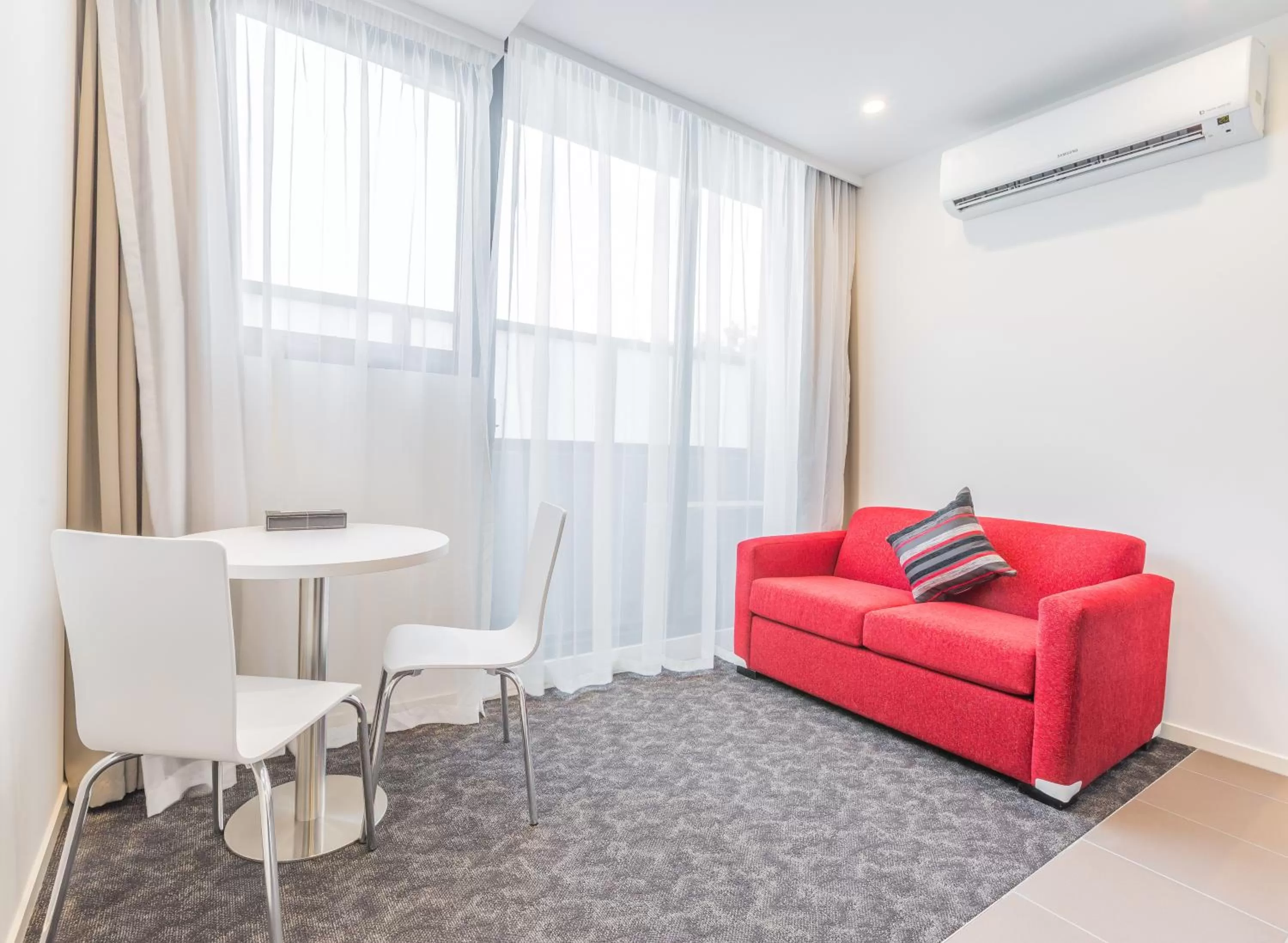 Seating area in Comfort Apartments Box Hill