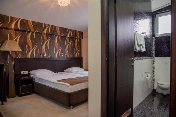 Bed in Hotel Crnogorska Kuća