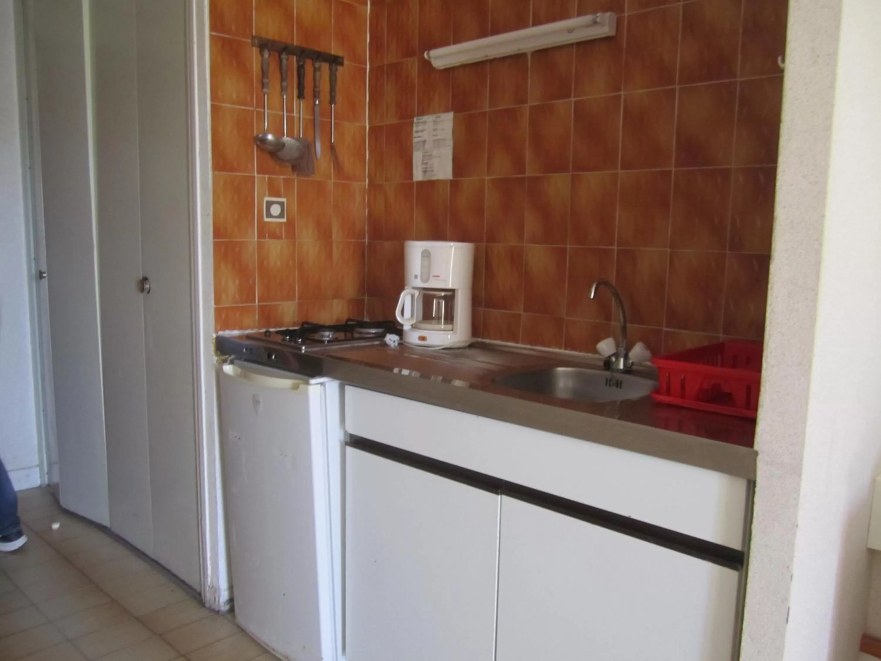 Kitchen or kitchenette in Motel Saint Francois