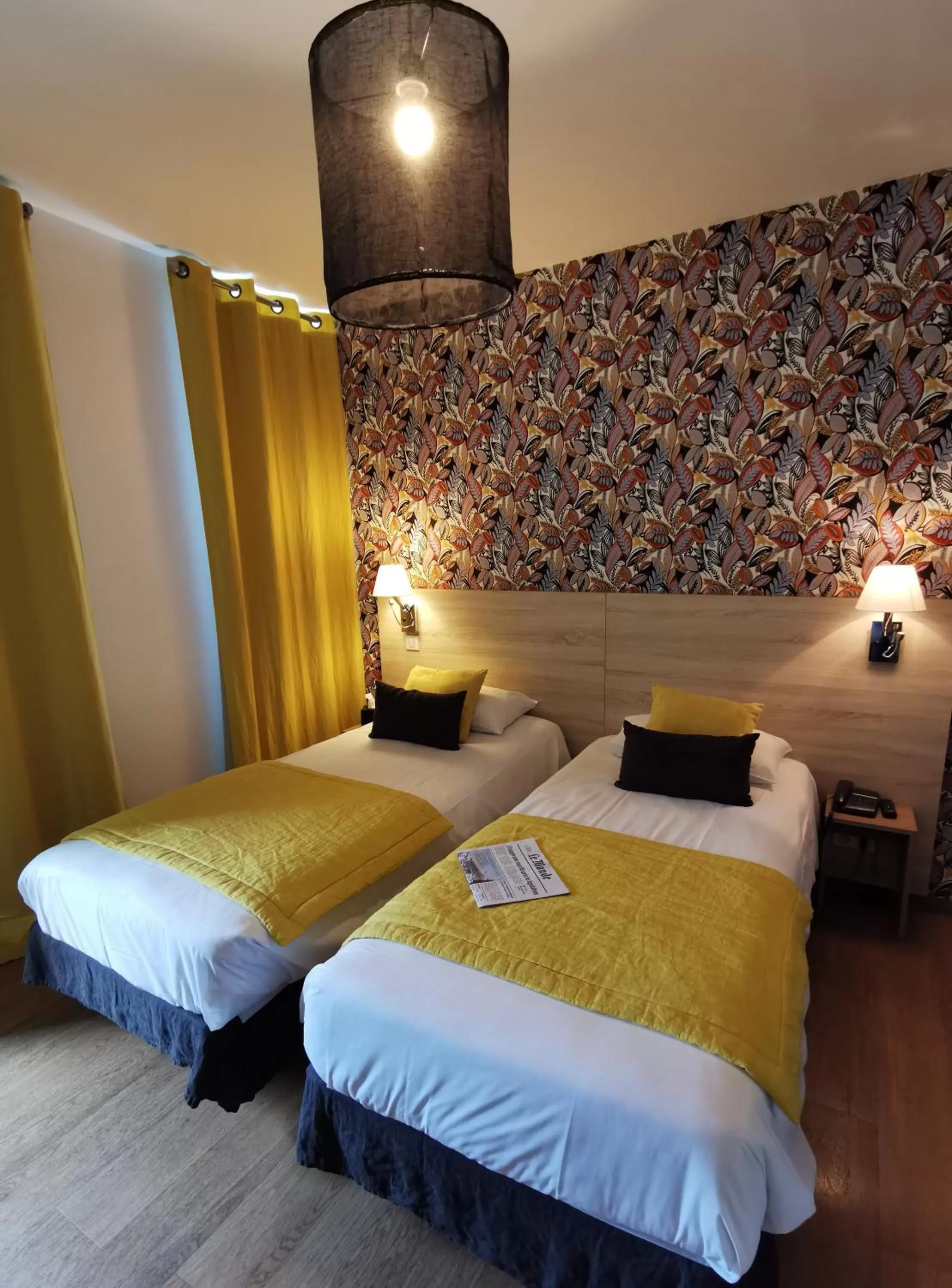 Photo of the whole room, Bed in Grand Hôtel Brive