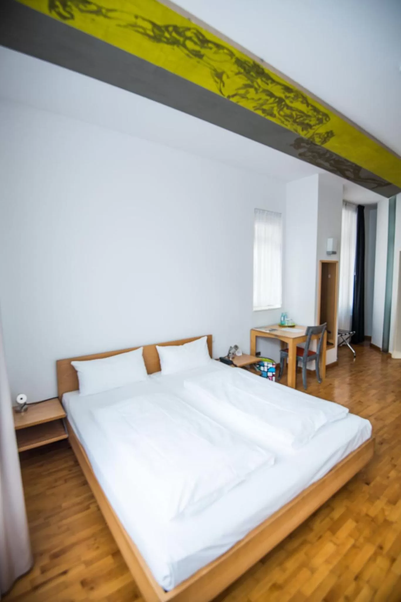 Bed in Art-Hotel Robert Mayer