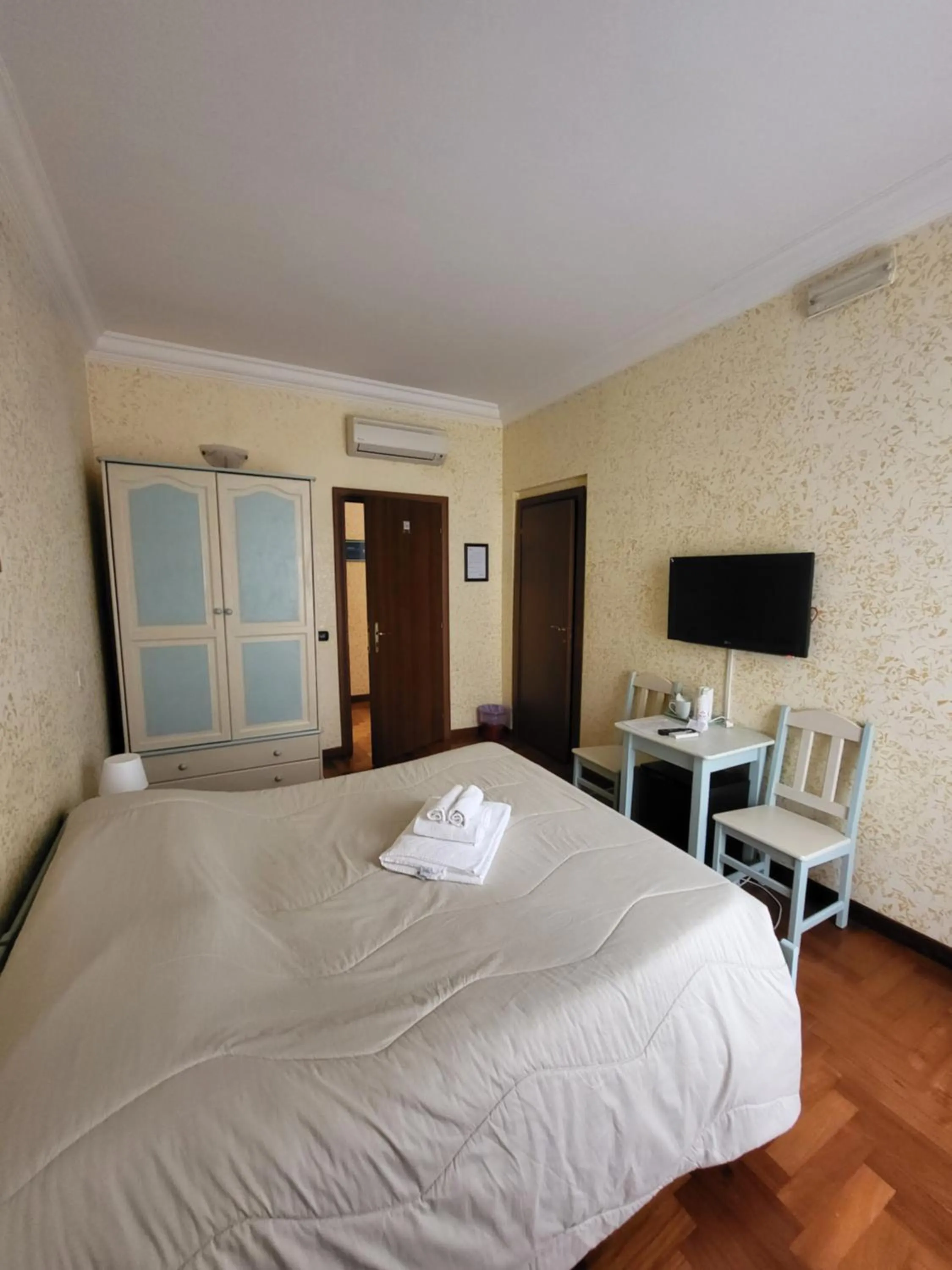 Bed in St. Peter's Rooms Rome