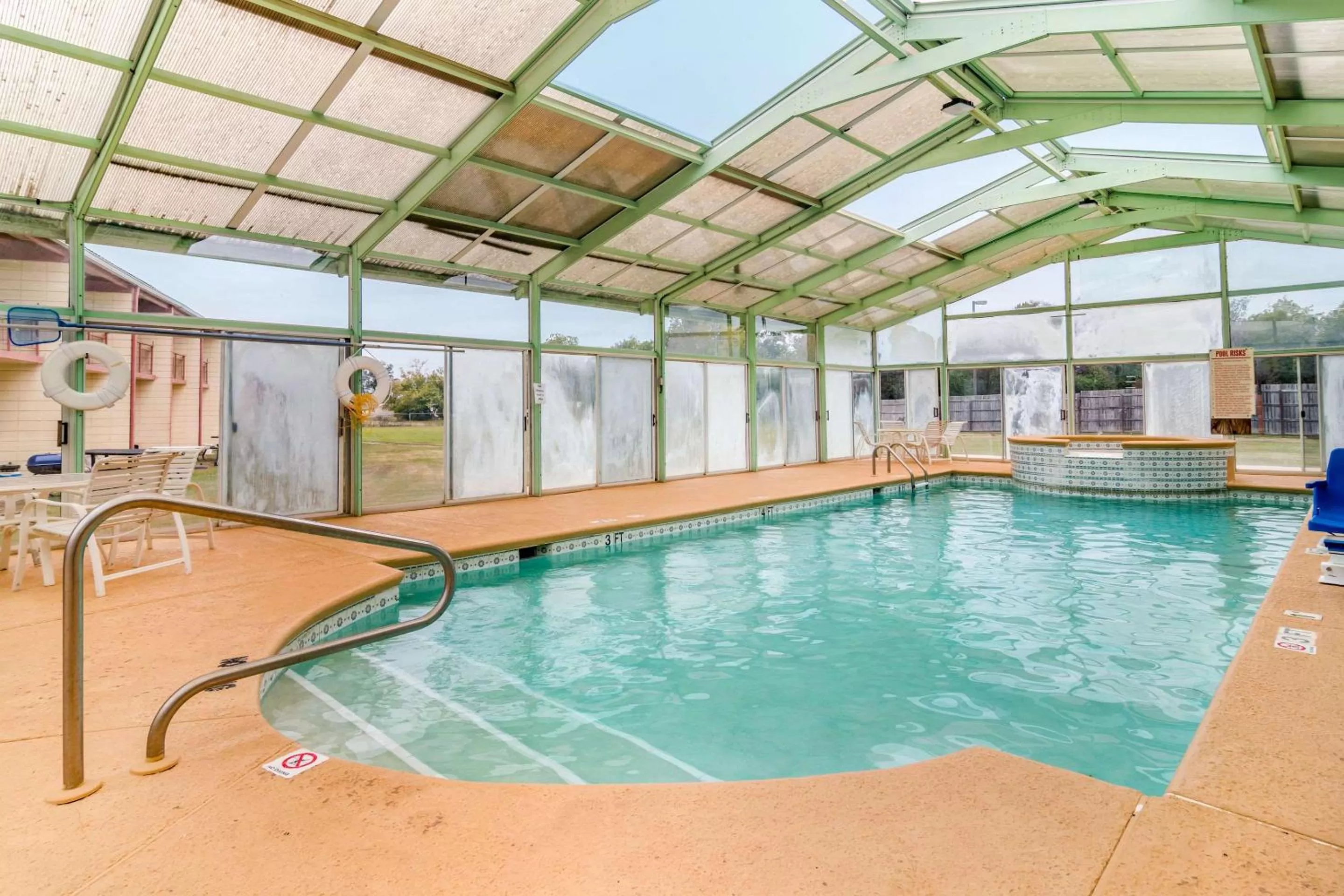 Pool view in Perry Inn & Suites By Capital O National Fairground GA I 75