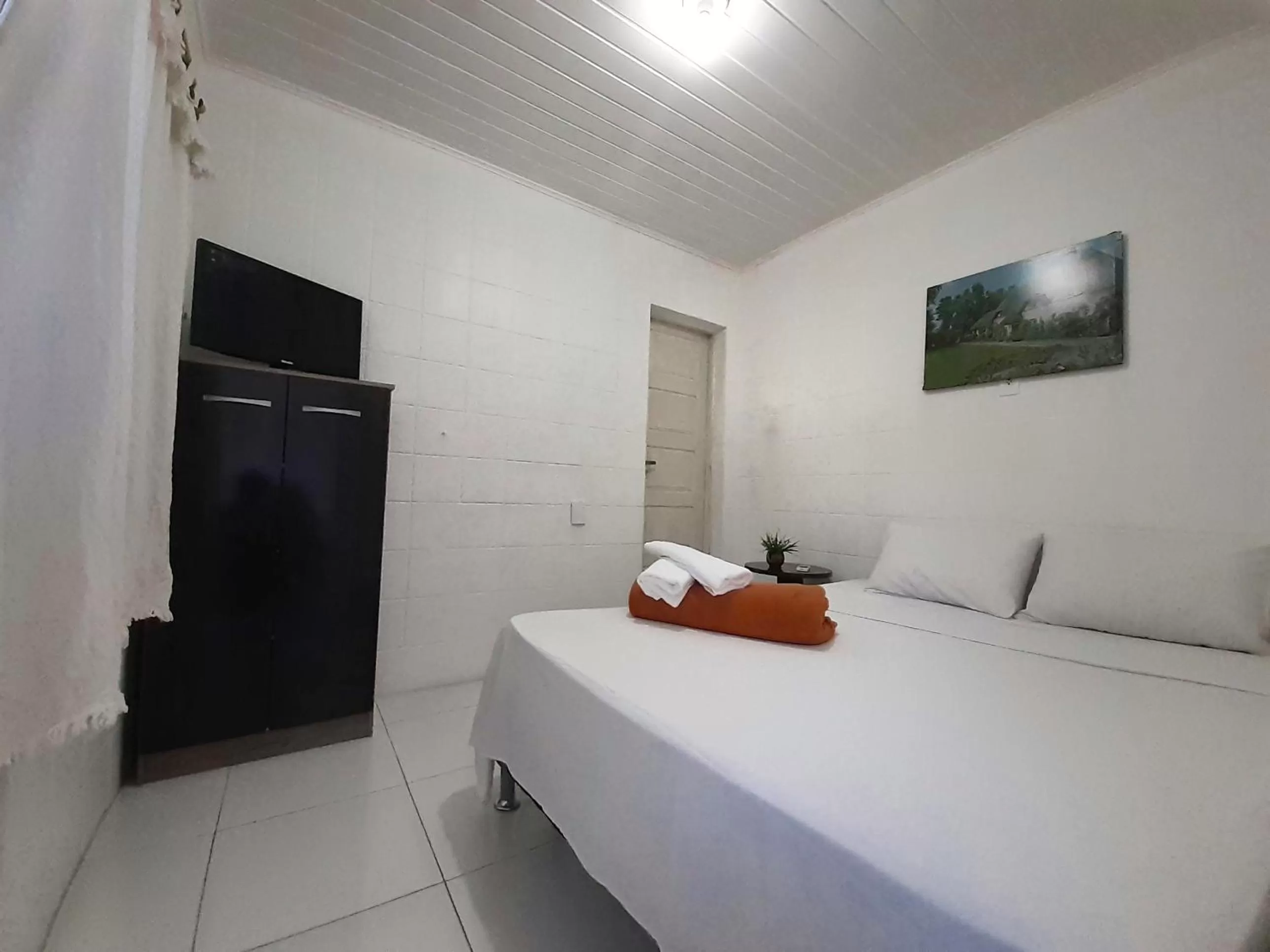 Photo of the whole room, TV/Entertainment Center in Hotel Pousada Villa Calhau