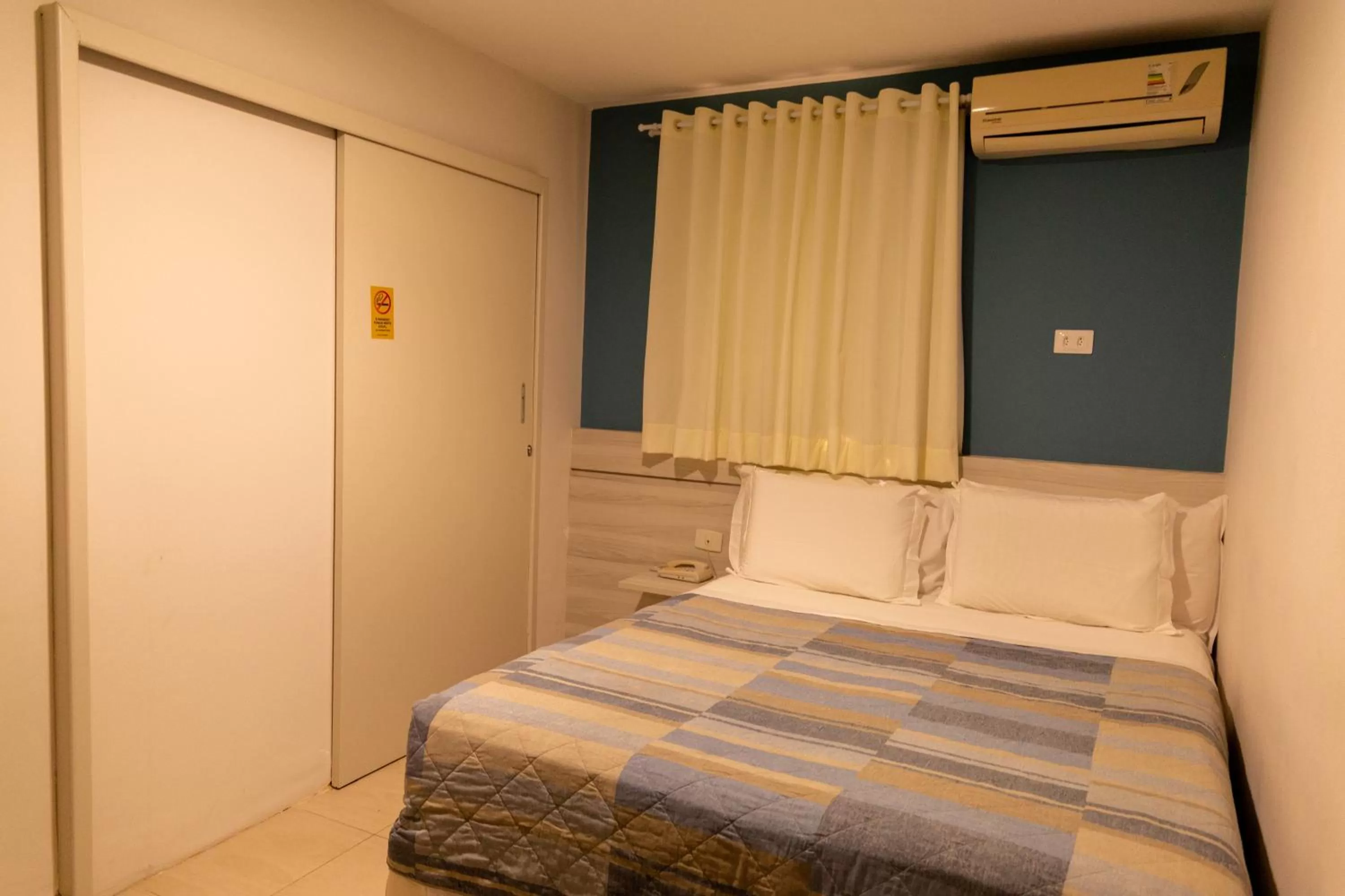 Bed in Pousada Mariluz