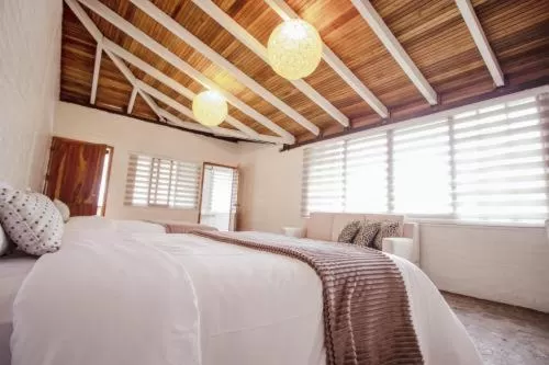 Bed in Rústic Hotel Quinta La Aurora