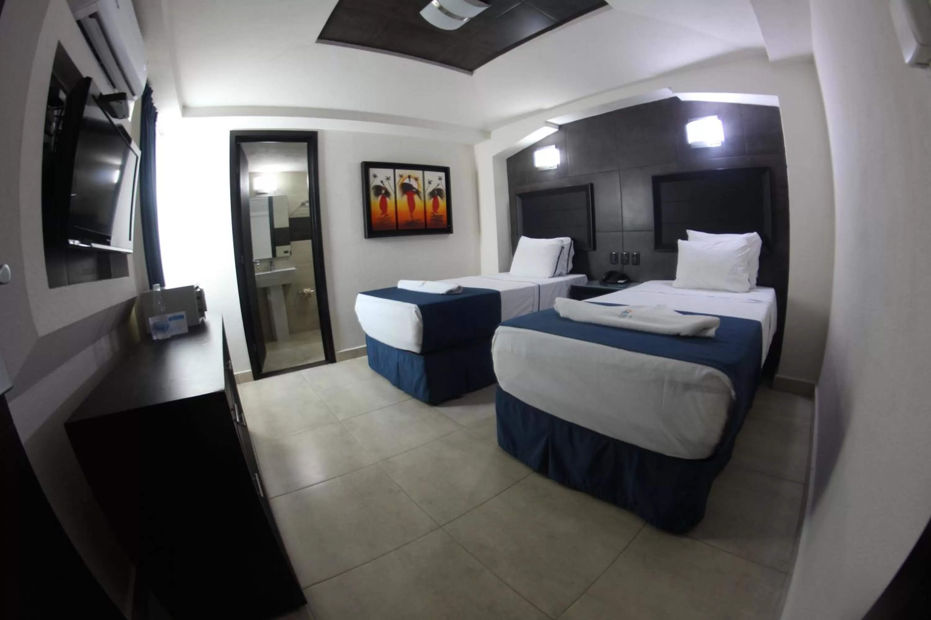 Photo of the whole room, Bed in Hotel Portonovo Plaza Malecon