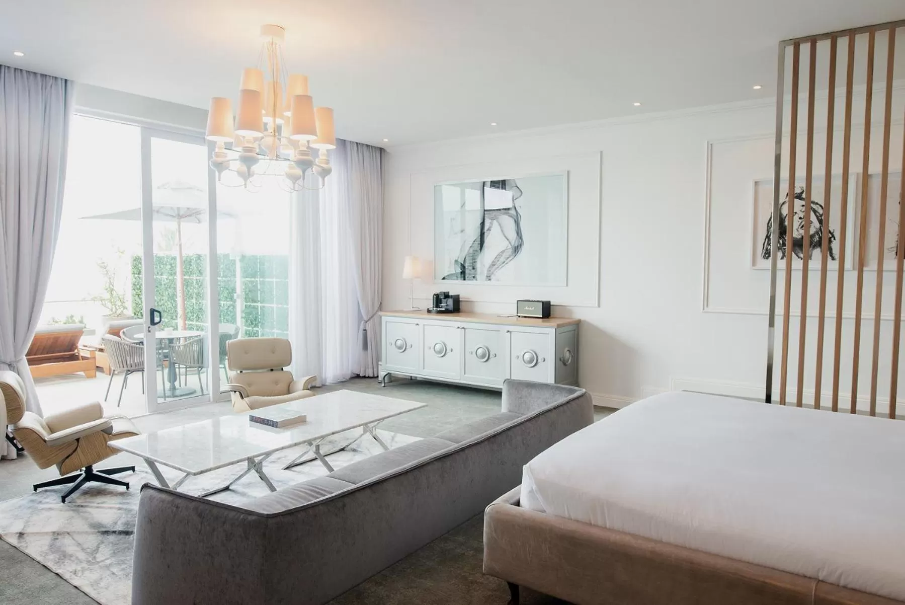 Seating area, Bed in The Marly Boutique Hotel